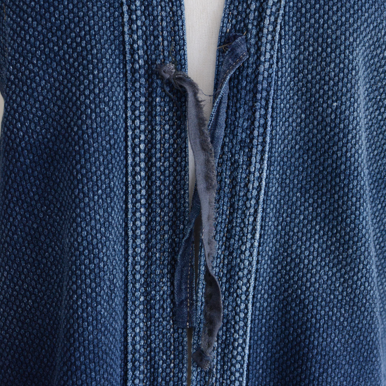 Japanese vintage kendo jacket with textured indigo cotton.