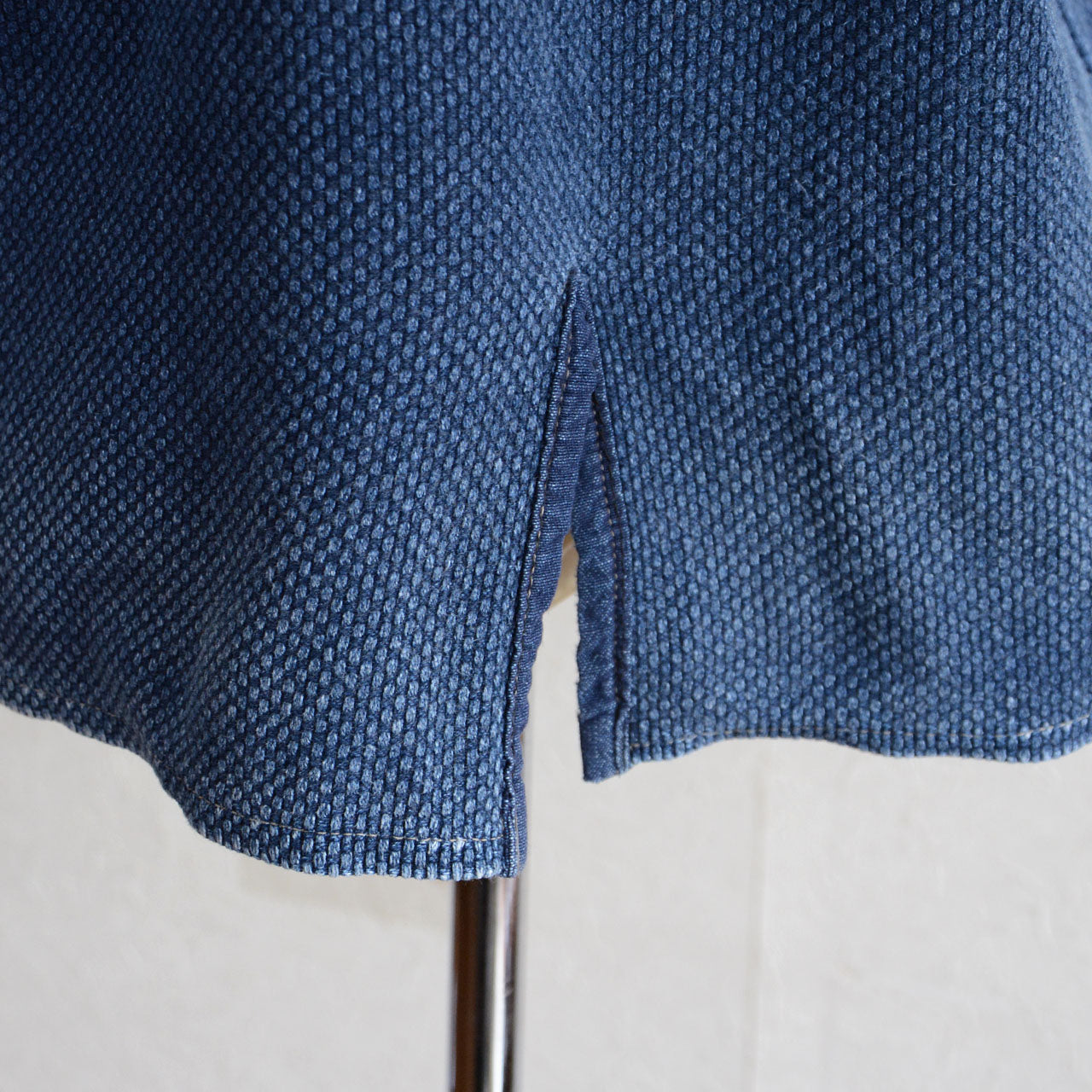 Textured indigo cotton used in a traditional Japanese kendo jacket.