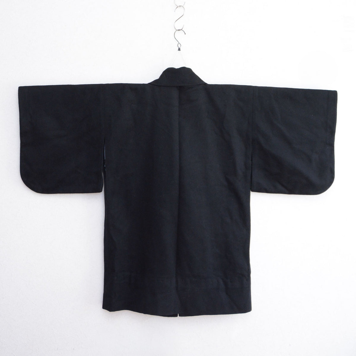 Black wool Japanese vintage kimono coat with a center back seam and wide sleeves