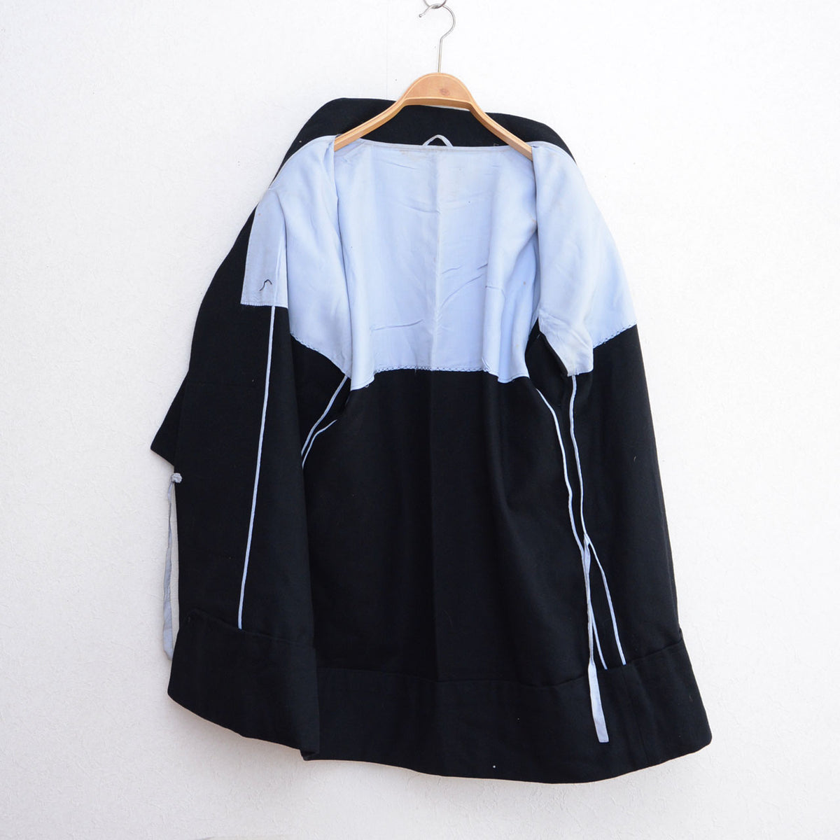 Black wool Japanese vintage kimono coat with pale upper lining and interior ties