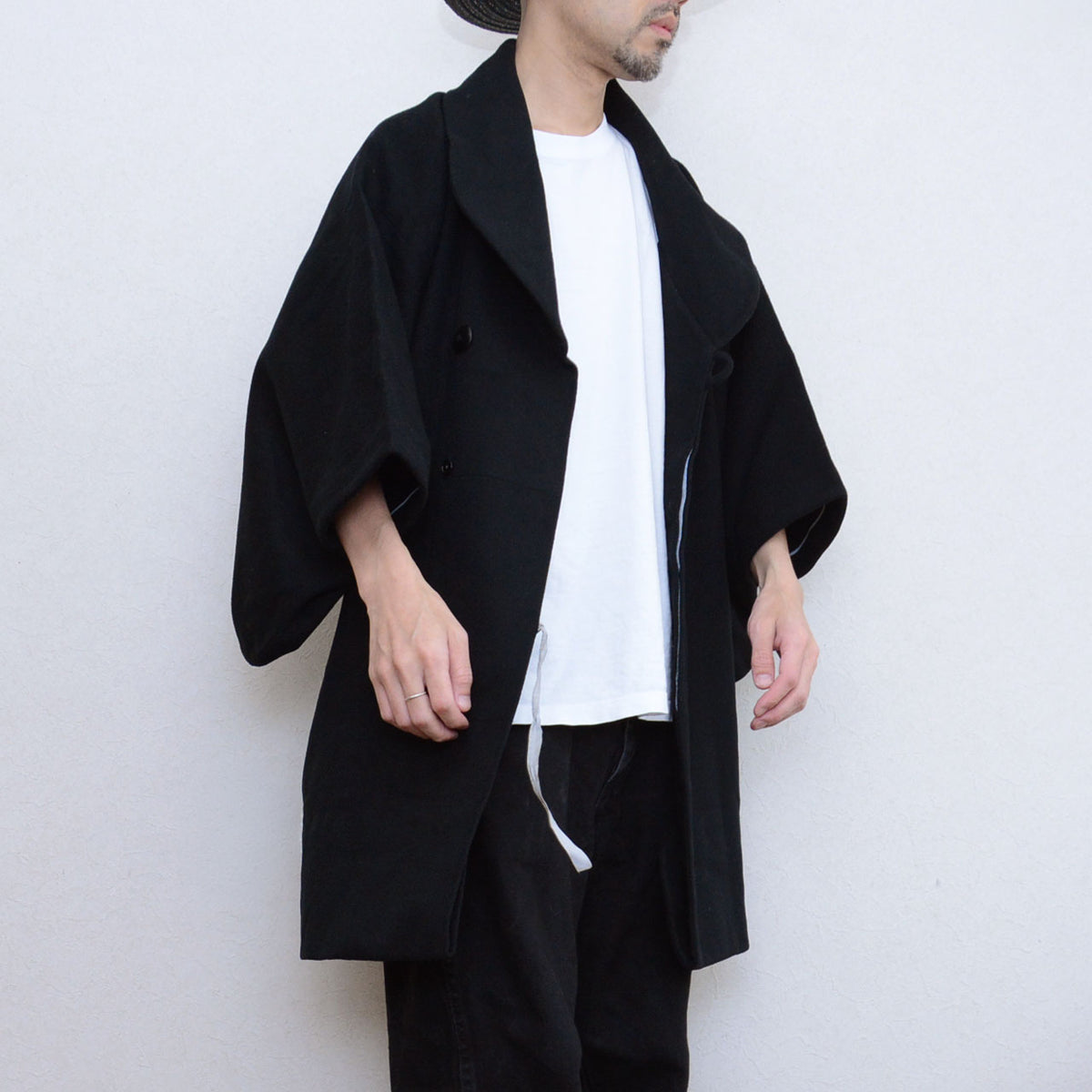 Black wool Japanese vintage kimono coat with a shawl collar, wide sleeves and interior ties