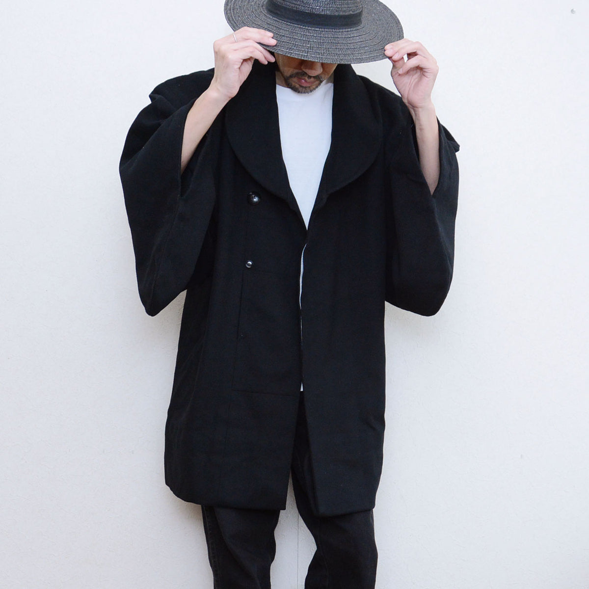 Black wool Japanese vintage kimono coat with a broad shawl collar and wide sleeves