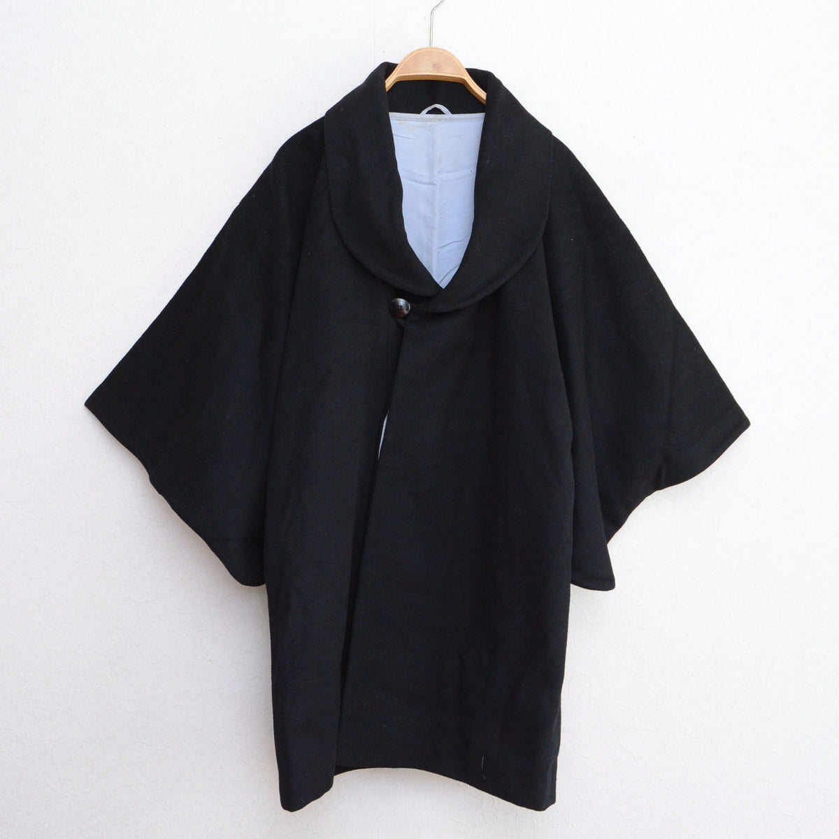 Black wool Japanese vintage kimono coat with a shawl collar, button fastening and pale lining