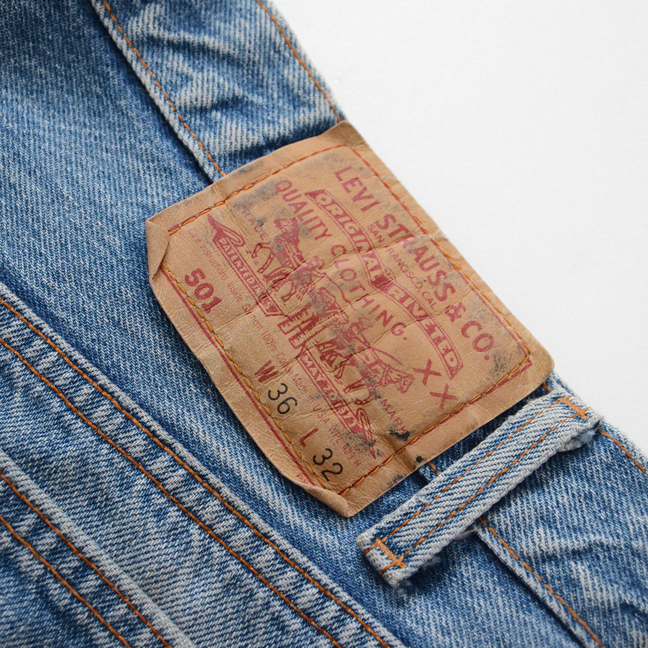 Levi's 501 vintage jeans, natural fading and distressing, raw cut hem