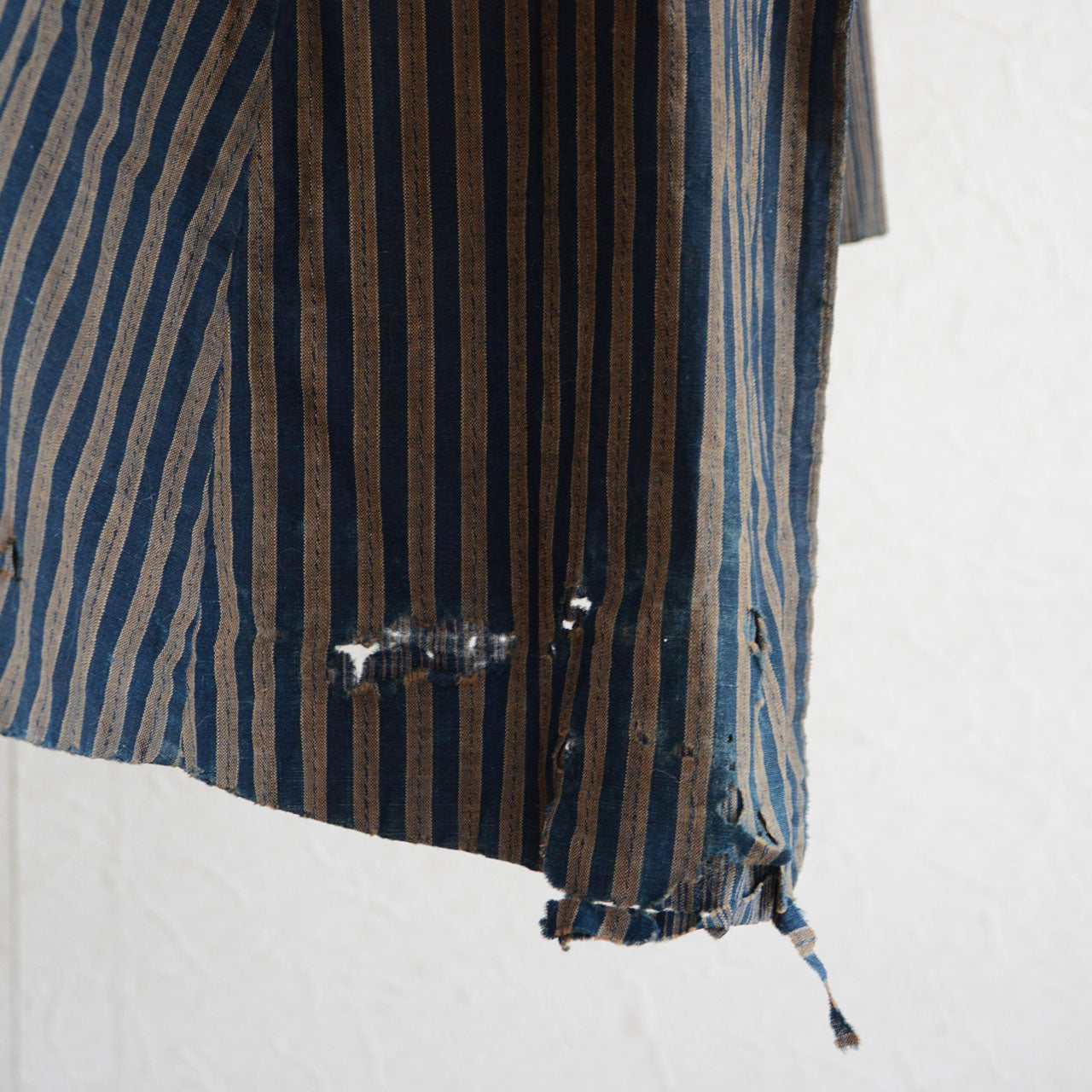 Traditional Japanese Dochu Kappa rain garment, indigo-dyed cotton fabric with cultural and historical background
