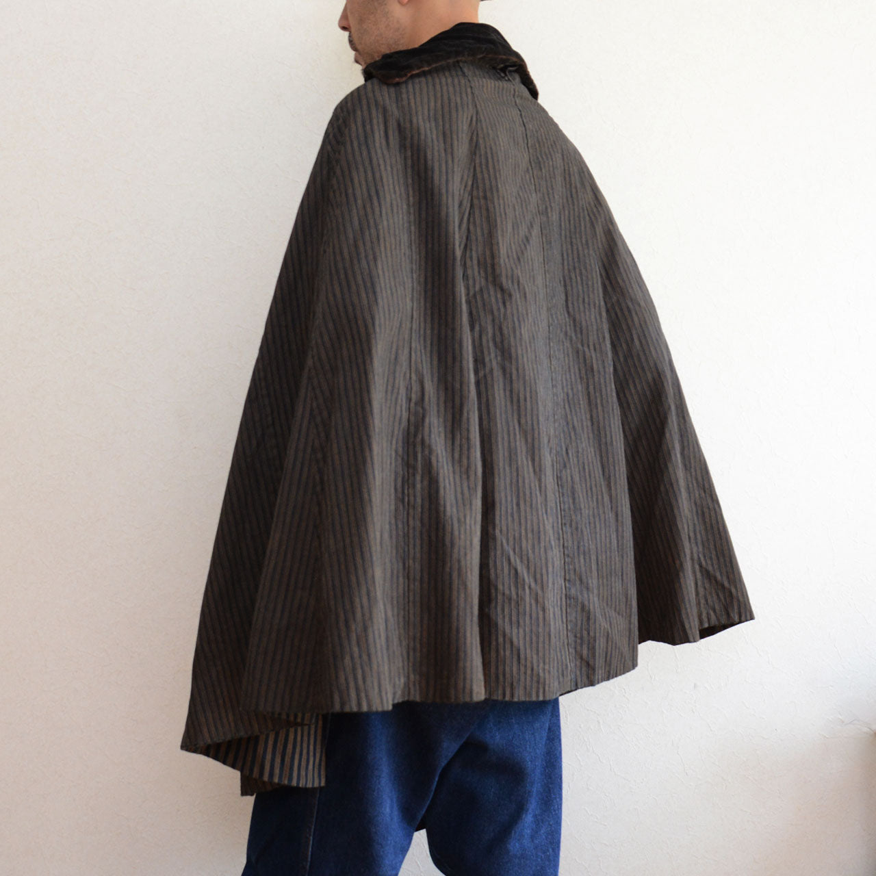 Historical Japanese Dochu Kappa outer cape, indigo cotton travel clothing from the Meiji to Showa period