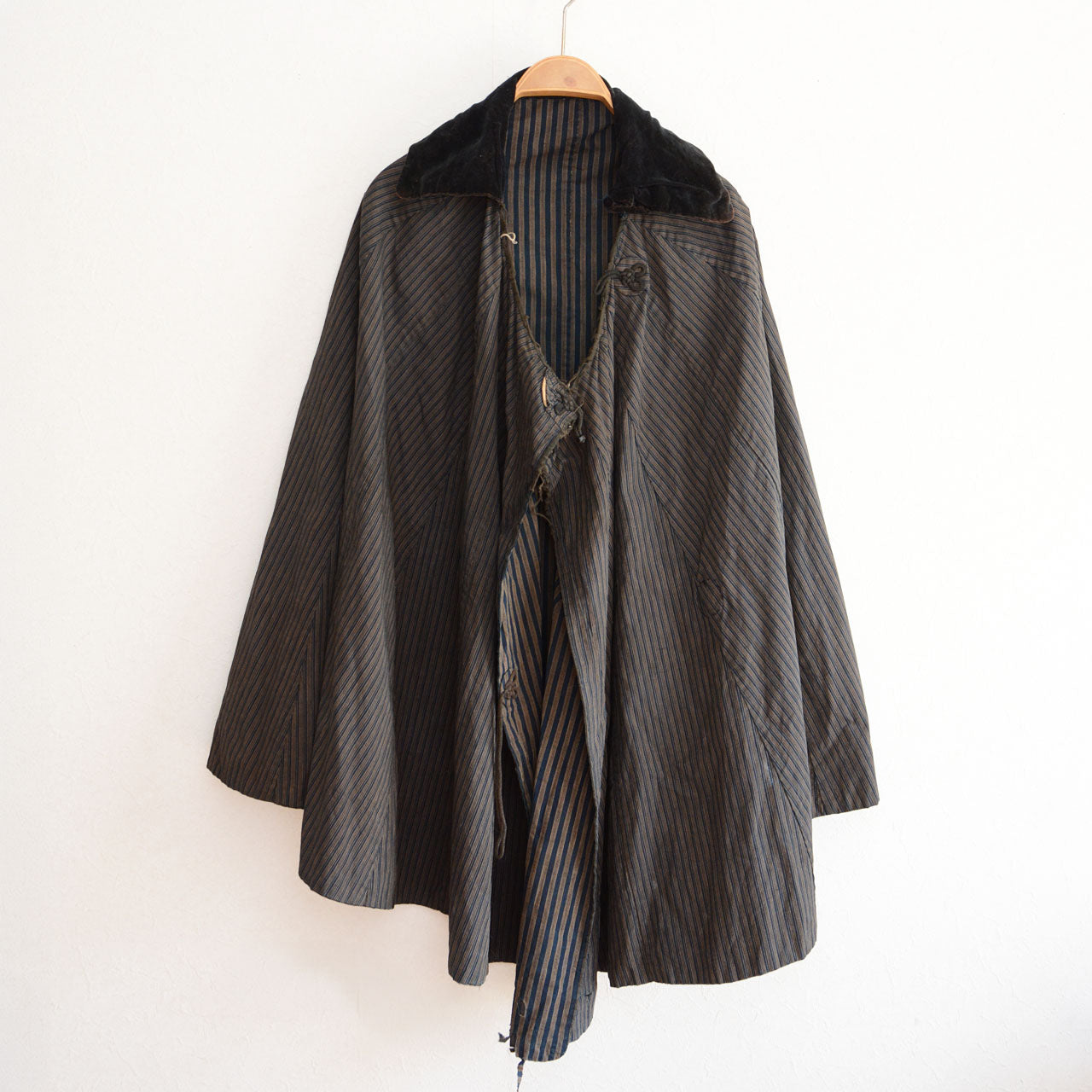 A historical Japanese cotton garment featuring traditional indigo dye from the early modern period.