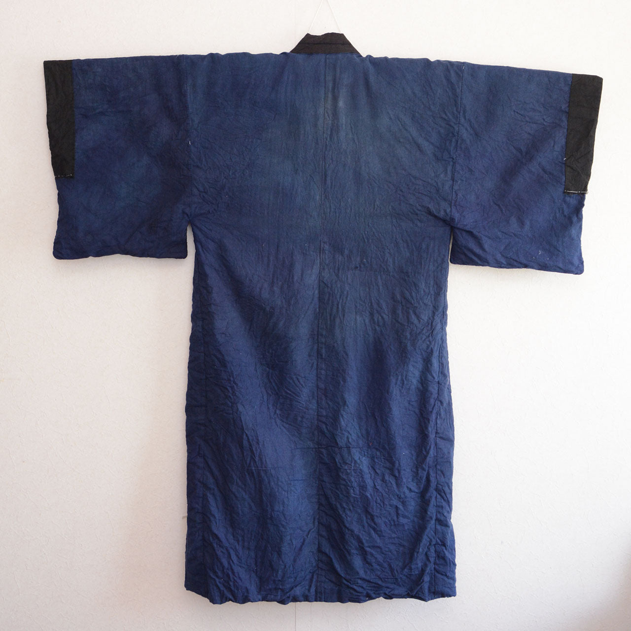 Lining side full view, back — deep blue solid cotton on kimono hanger, early Showa era Japan vintage men's kimono