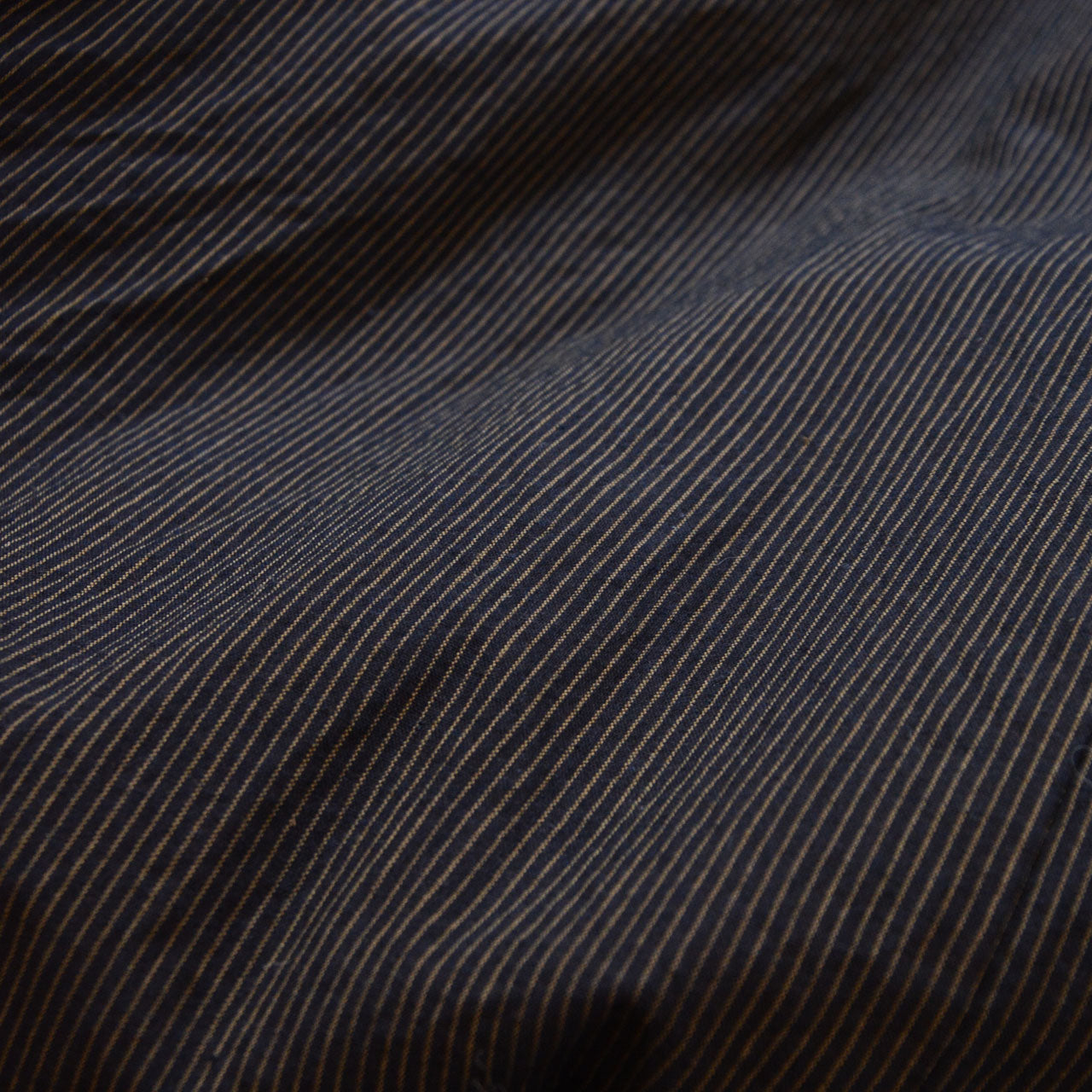 Close-up of cotton fabric texture — fine stripe weave detail, early Showa era Japan vintage men's kimono