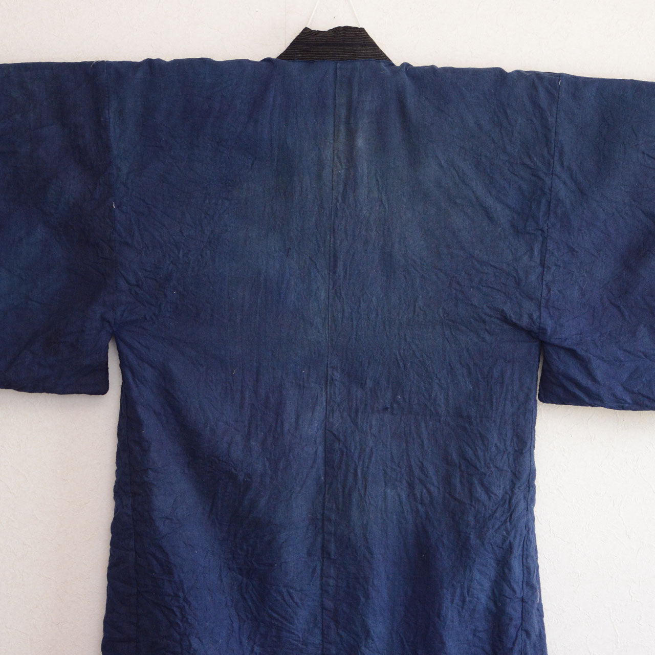 Fading on back panel — age-related color variation on deep blue cotton lining, early Showa era Japan vintage men's kimono