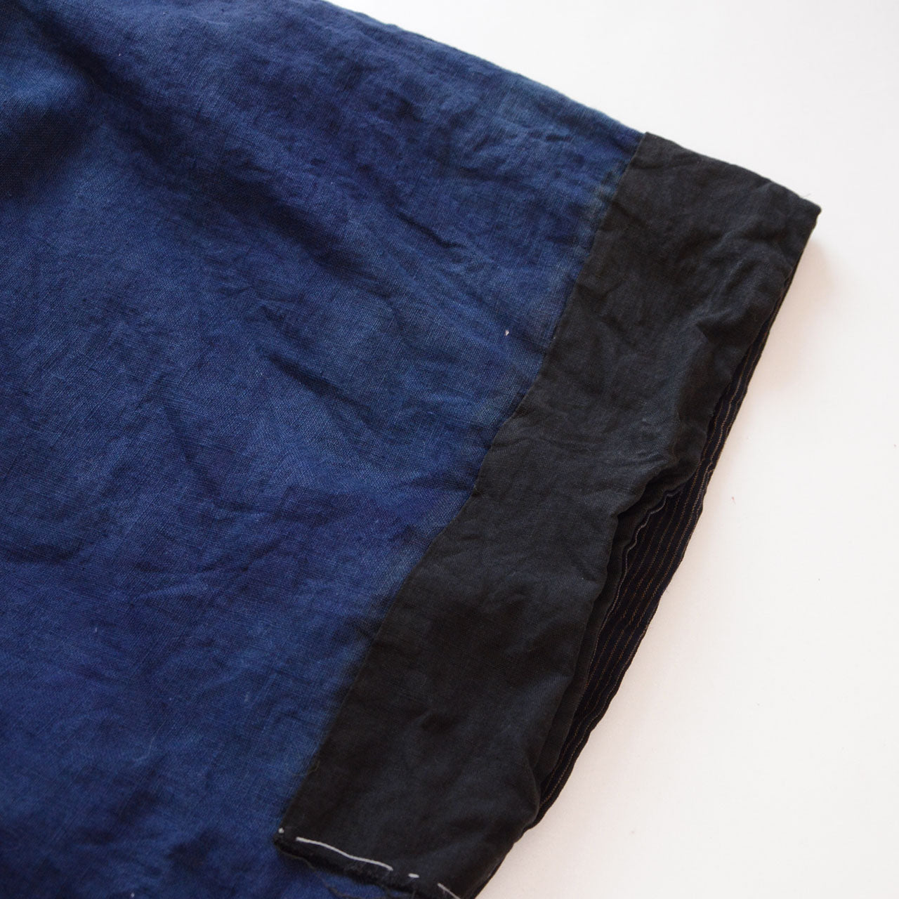 Fading on sleeve — age-related color variation on deep blue cotton lining, early Showa era Japan vintage men's kimono