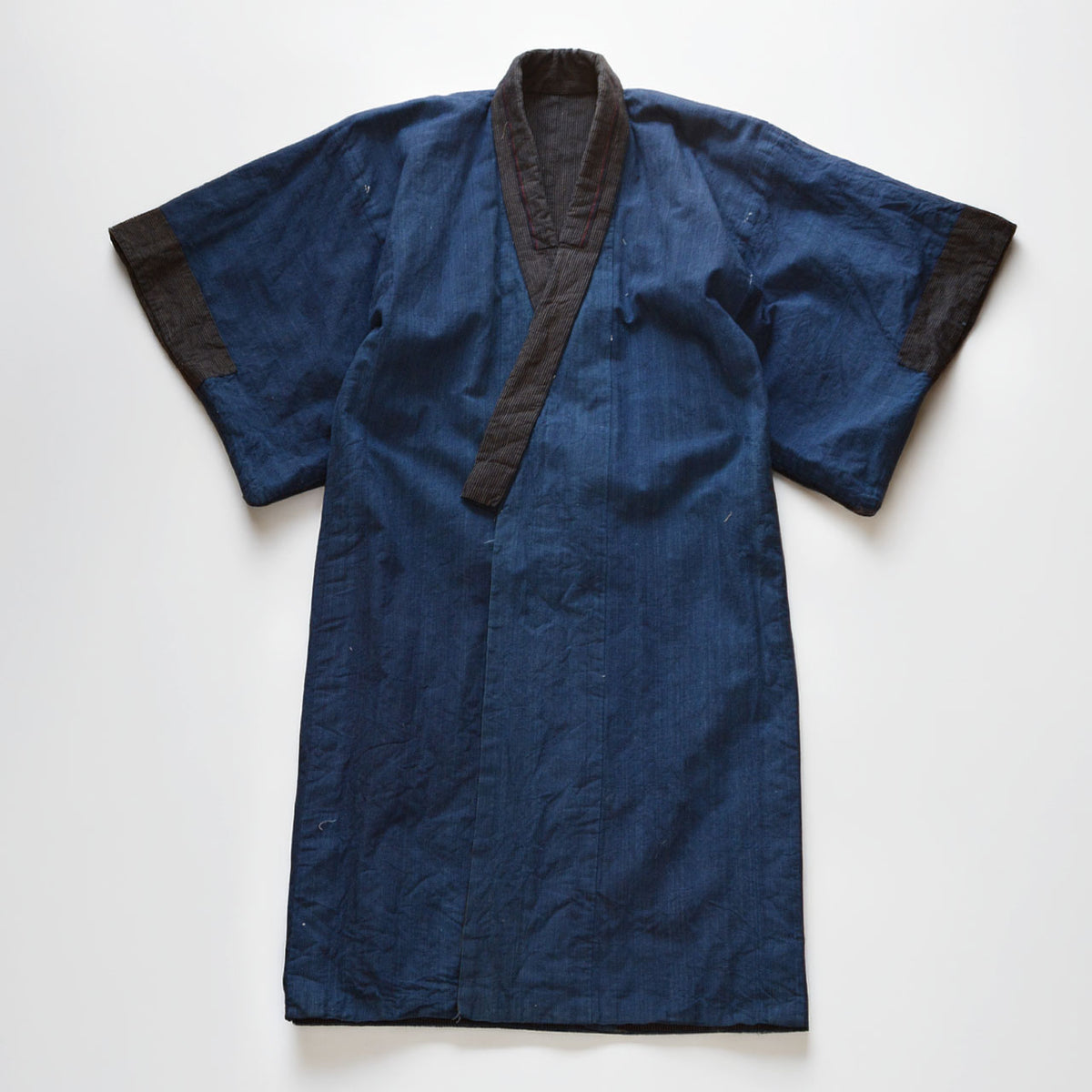 Solid indigo cotton lining of a Taisho to early Showa men's kimono robe