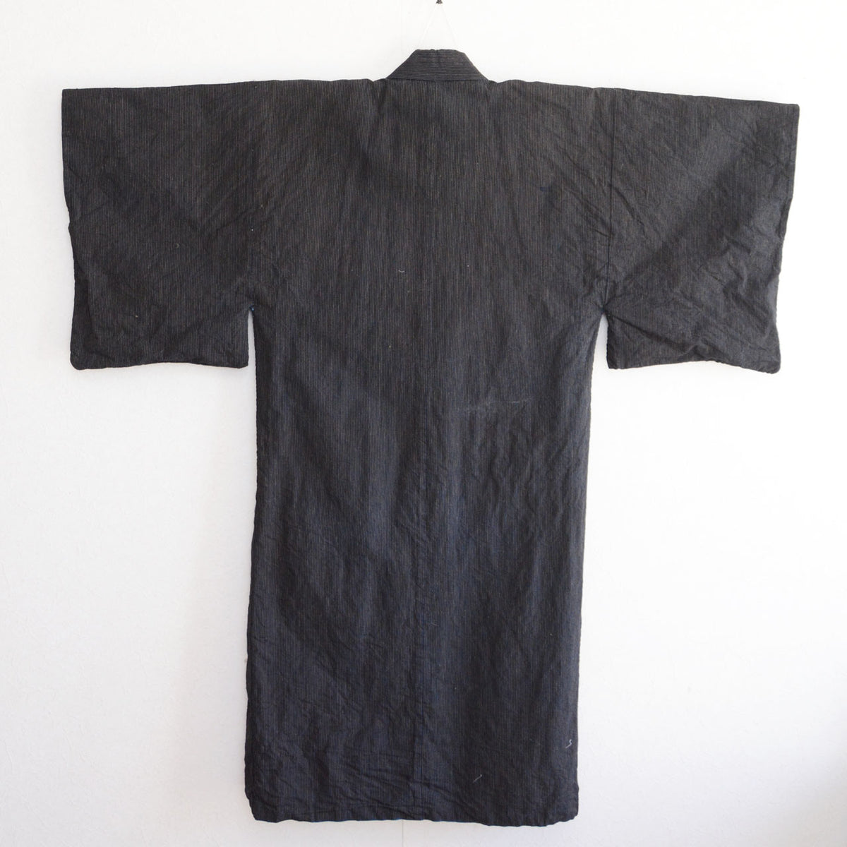 Striped indigo cotton back of a men's vintage kimono robe