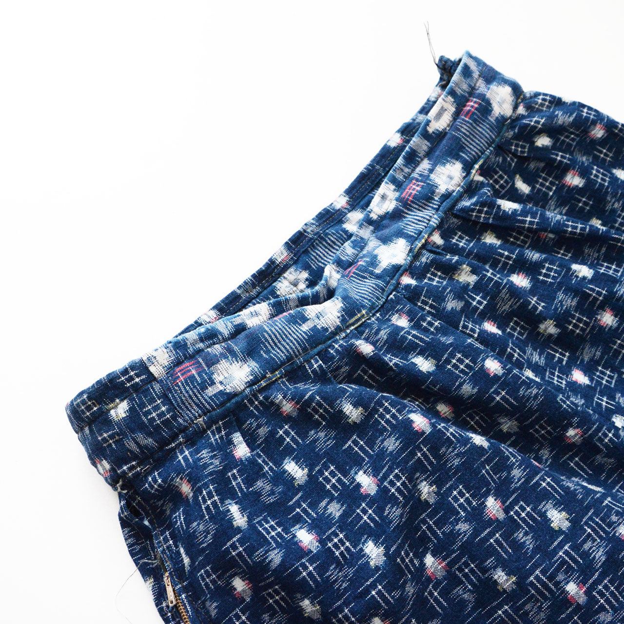 Mompe waistband in contrasting kasuri cotton fabric, crazy patchwork construction with multiple ikat patterns, mid-Showa vintage Japan