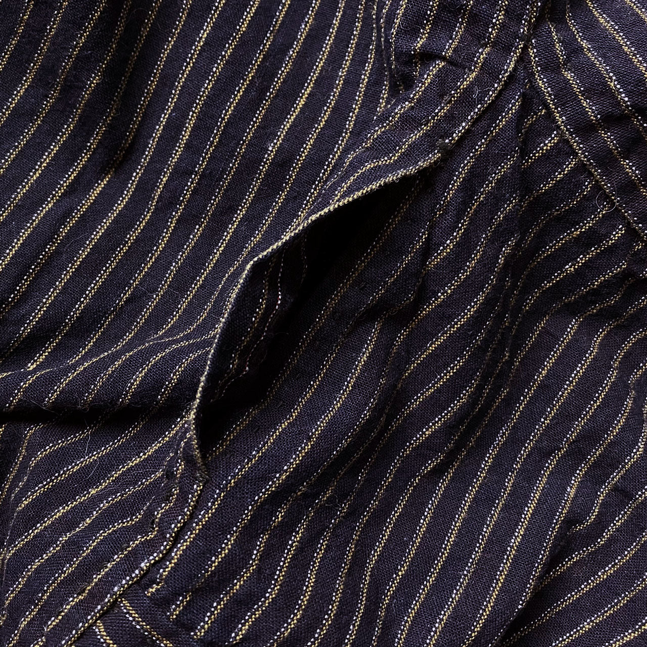 Bar-tack reinforced opening at front crotch, rare structural detail of Showa era Japanese mompe pants, navy stripe cotton, Tohoku vintage