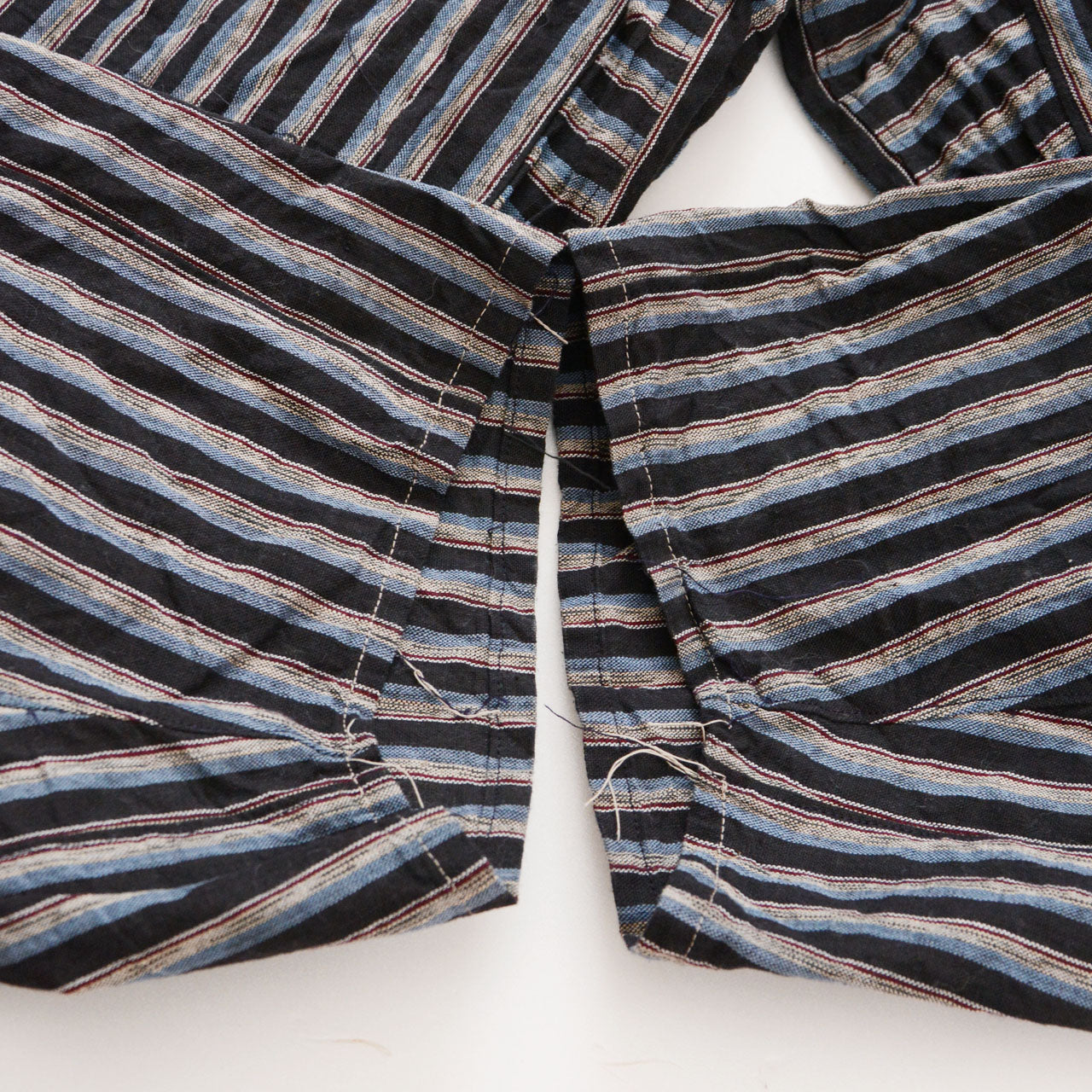 Hem of vintage Japanese monpe pants in striped cotton, mid-Showa era