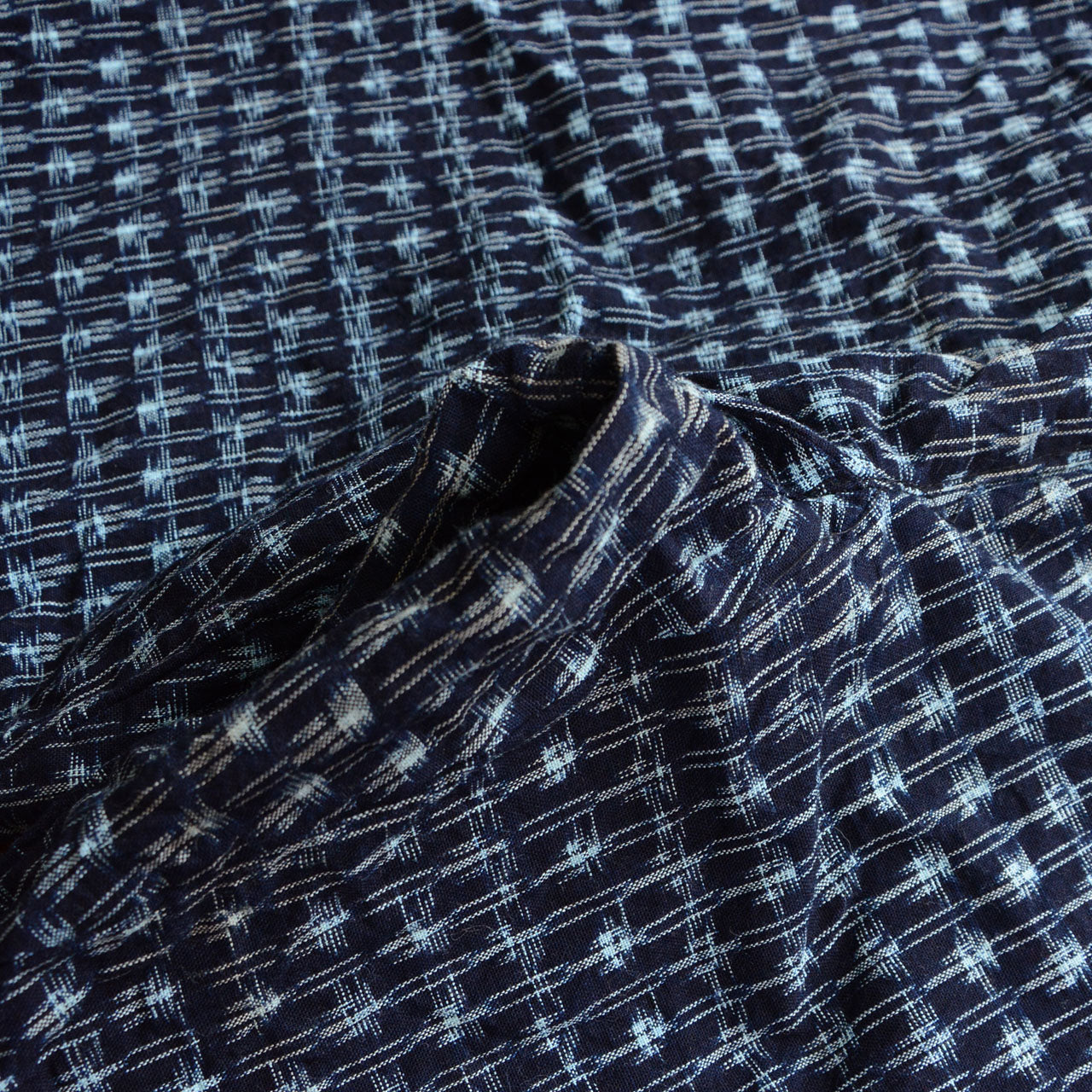 Gusset at crotch of indigo Bingo kasuri monpe pants showing traditional Japanese workwear construction