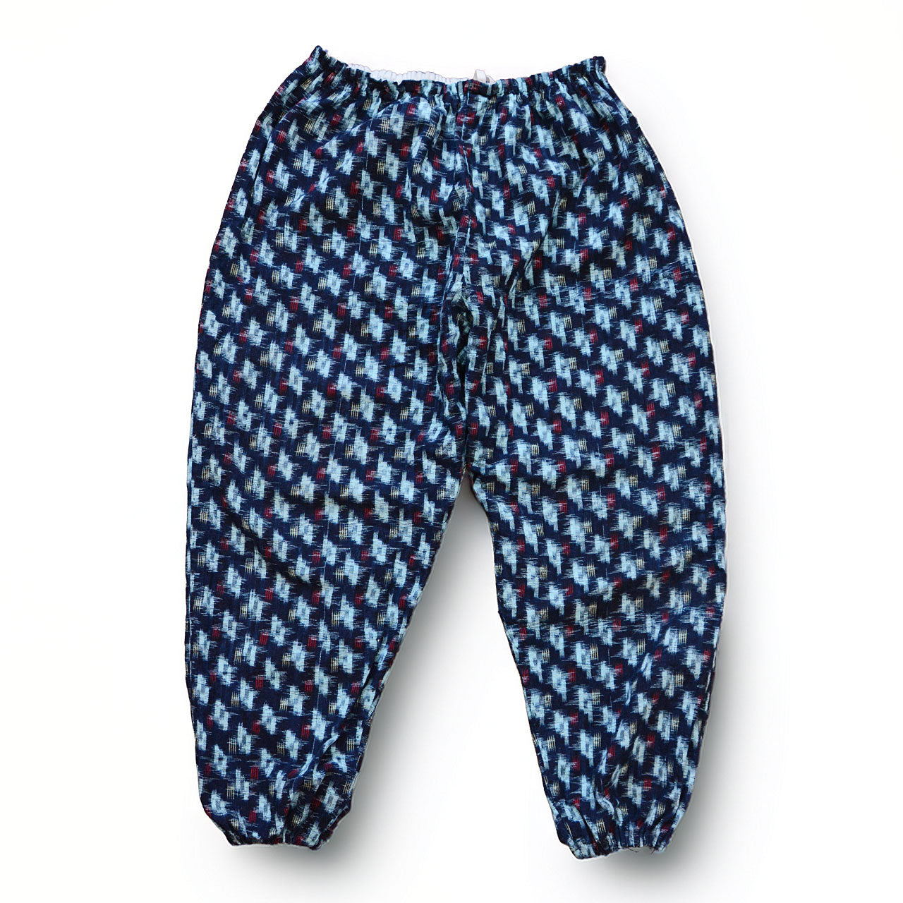 Indigo kasuri cotton monpe pants, front view, navy and white ikat pattern, elastic waist, Mid-Showa era Japanese vintage workwear