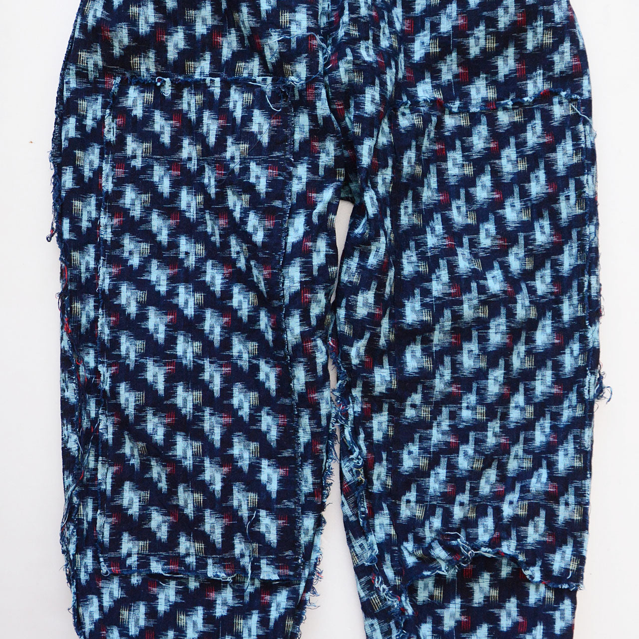Interior front patch reinforcement of indigo kasuri cotton monpe pants, hand-stitched cotton patch, Mid-Showa era Japan vintage