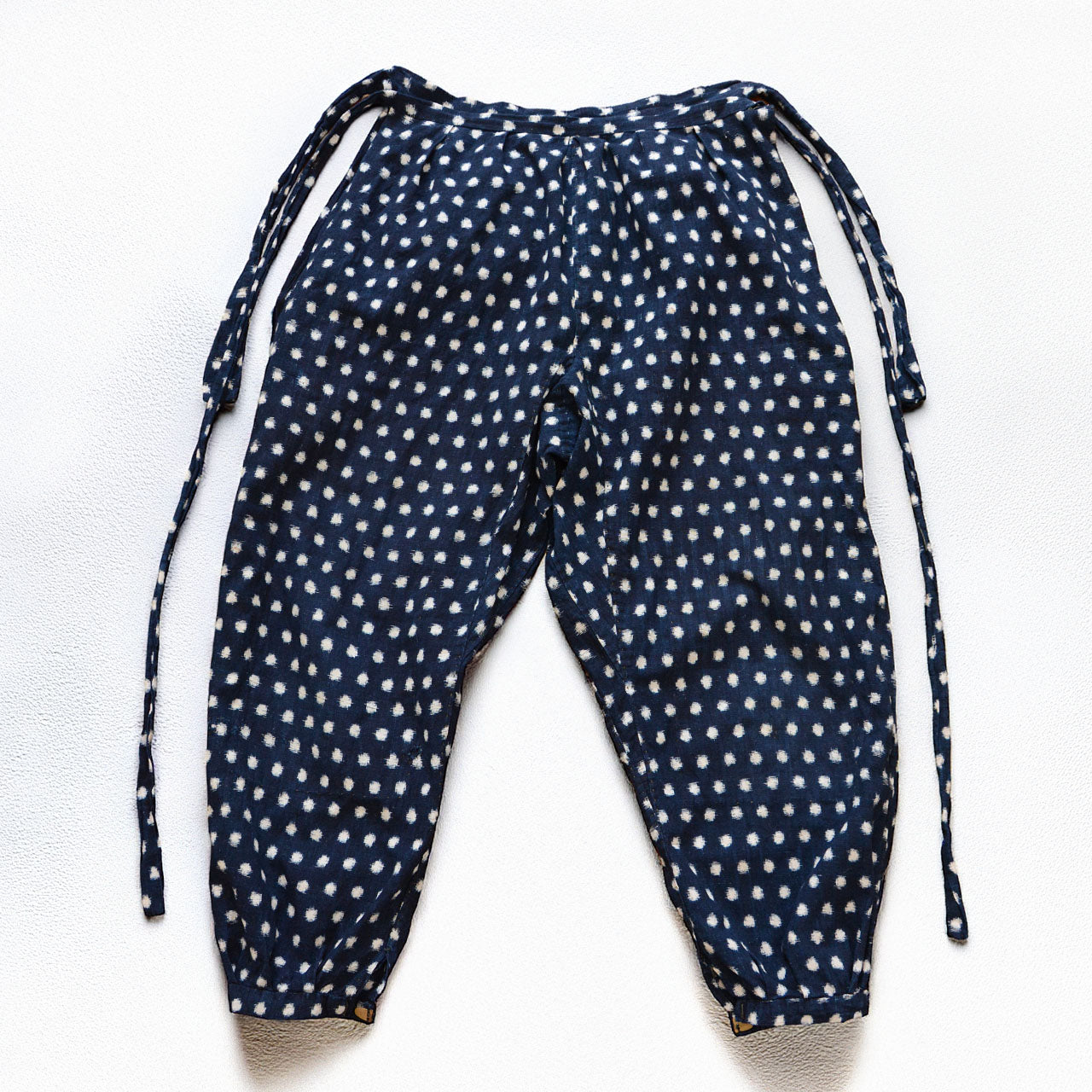 Indigo-dyed cotton monpe pants, back, snow pattern (Yukinko) kasuri, early Showa era Japan vintage