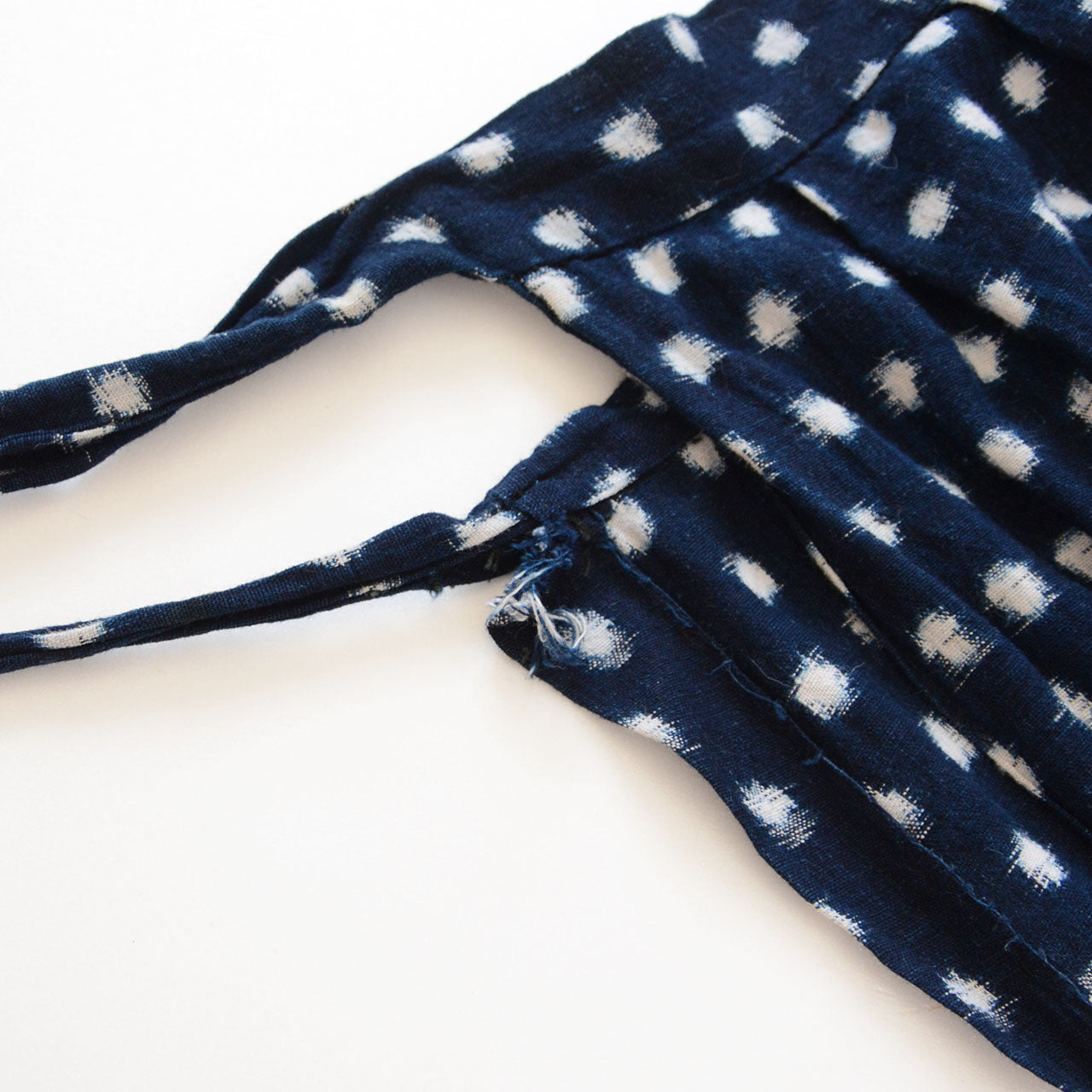 Fabric tie closures at waist, indigo snow pattern (Yukinko) kasuri cotton monpe, early Showa era Japan vintage