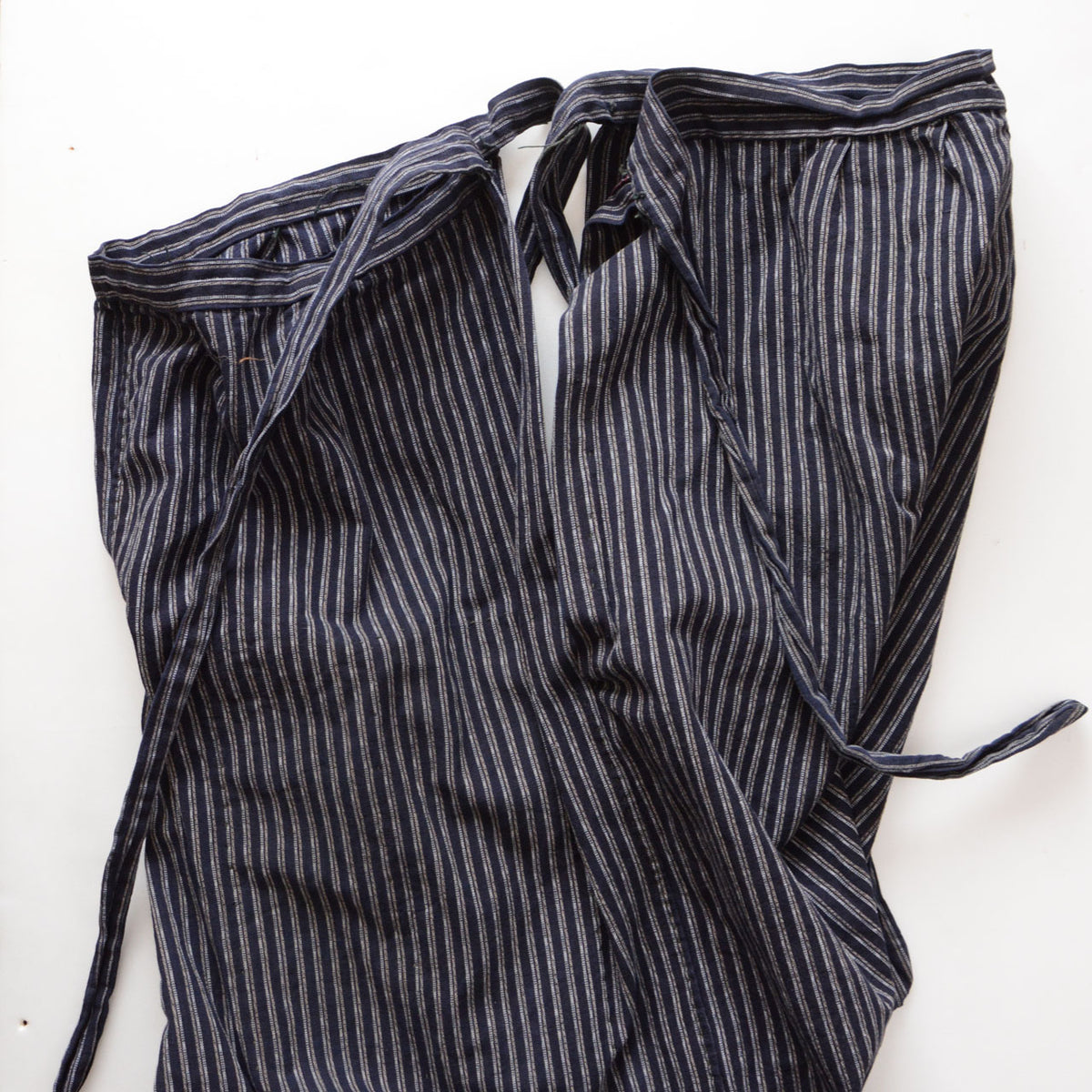 Striped cotton monpe side slit separating front and rear waist sections