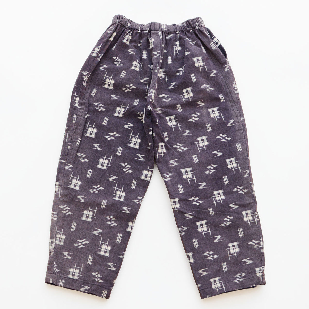 Showa-era Japanese vintage cotton kasuri monpe pants with an elastic waistband and tapered legs