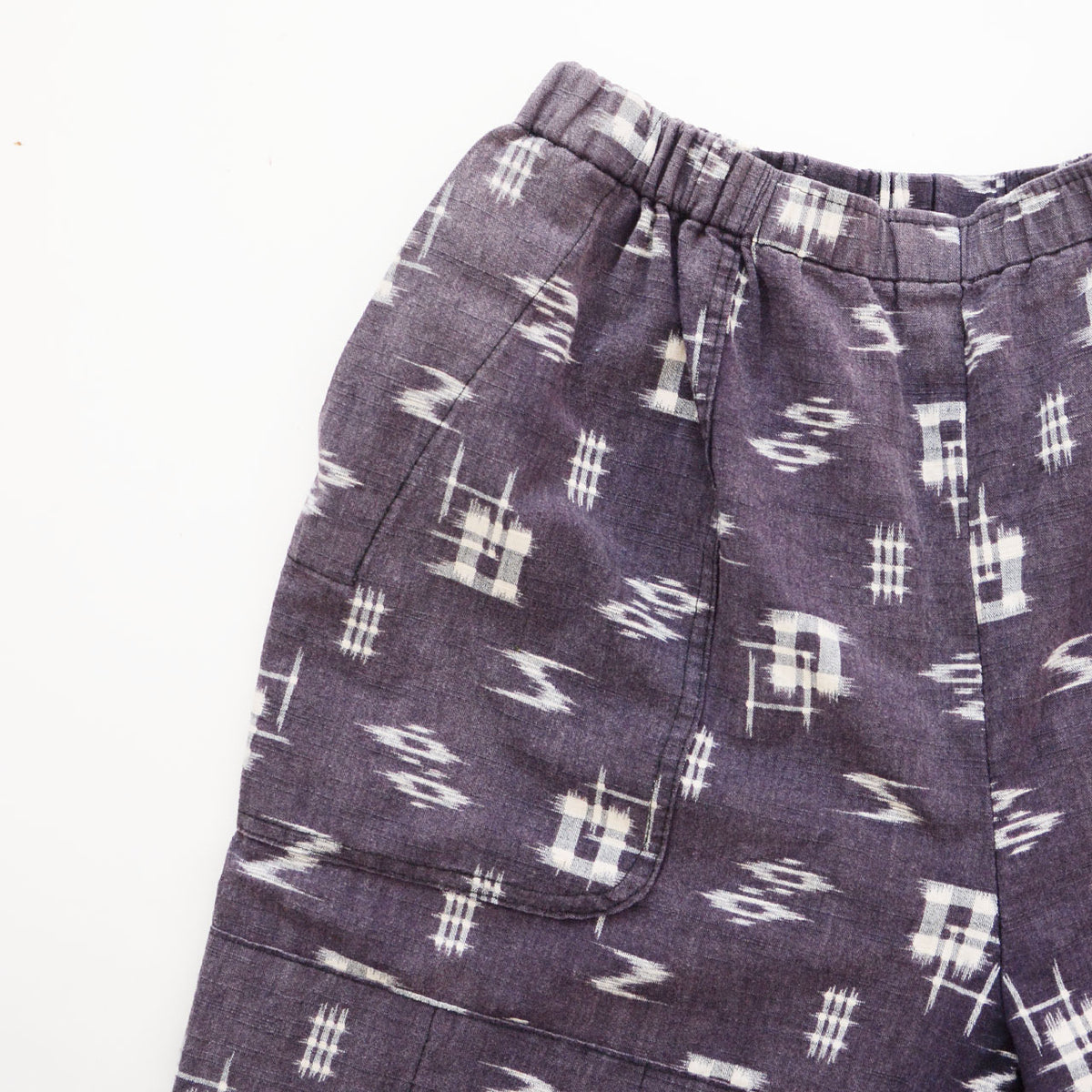 Single front pocket with rounded lower corners on Showa-era Japanese vintage cotton kasuri monpe pants