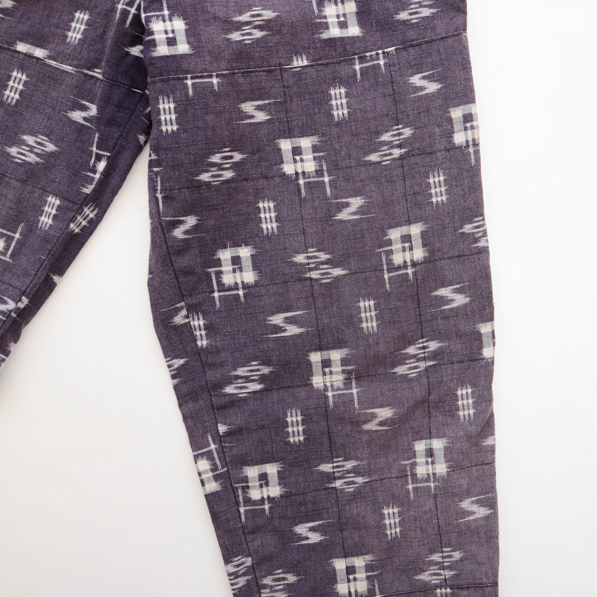 Grid-stitched outer reinforcement panel on Showa-era Japanese vintage cotton kasuri monpe pants