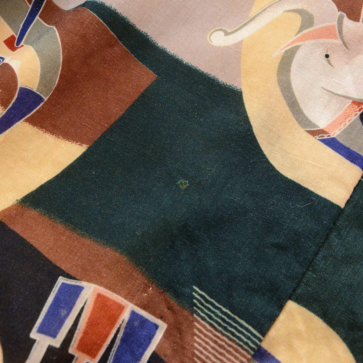 Small area of fabric damage in the dark green section of a Japanese vintage nagajuban kimono
