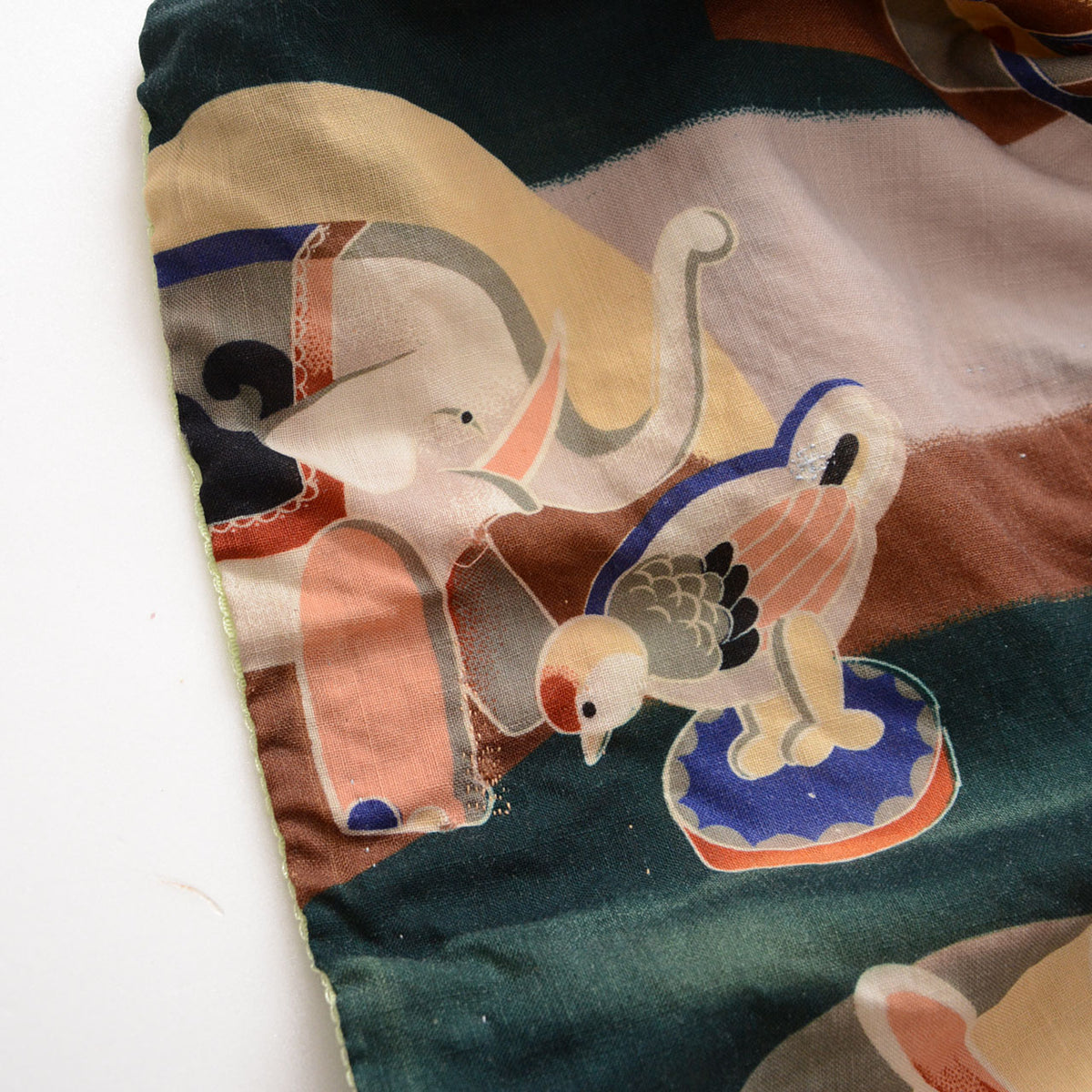 Elephant and bird motifs in cream, peach, grey and blue on a Japanese vintage nagajuban kimono