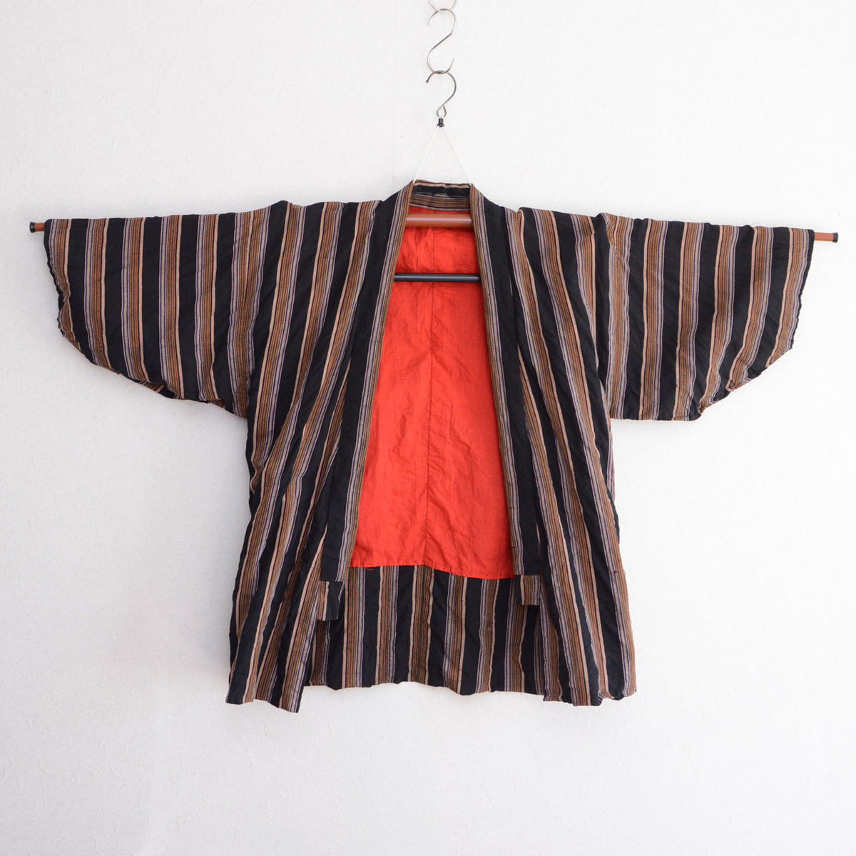 Japanese vintage cotton noragi with black multicolored stripes and red lining