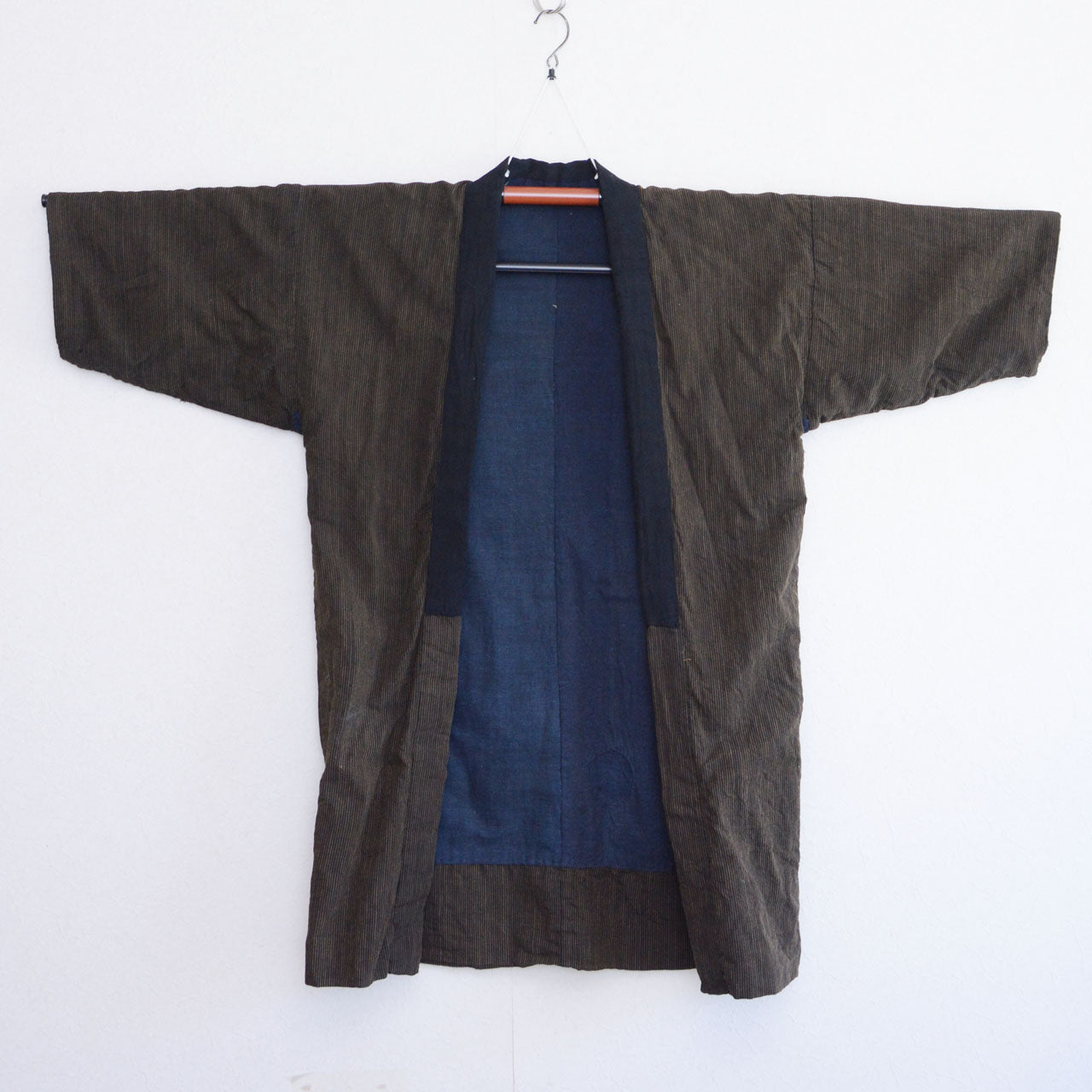 Boro noragi jacket, striped cotton outer, indigo-dyed cotton lining visible, open front, pre-WWII Japan vintage, Tohoku