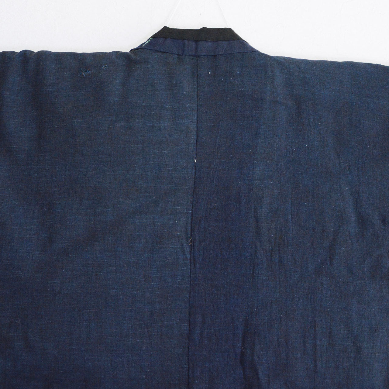 Boro noragi jacket, indigo-dyed cotton lining, back view, color unevenness and age patina, pre-WWII Japan vintage, Tohoku