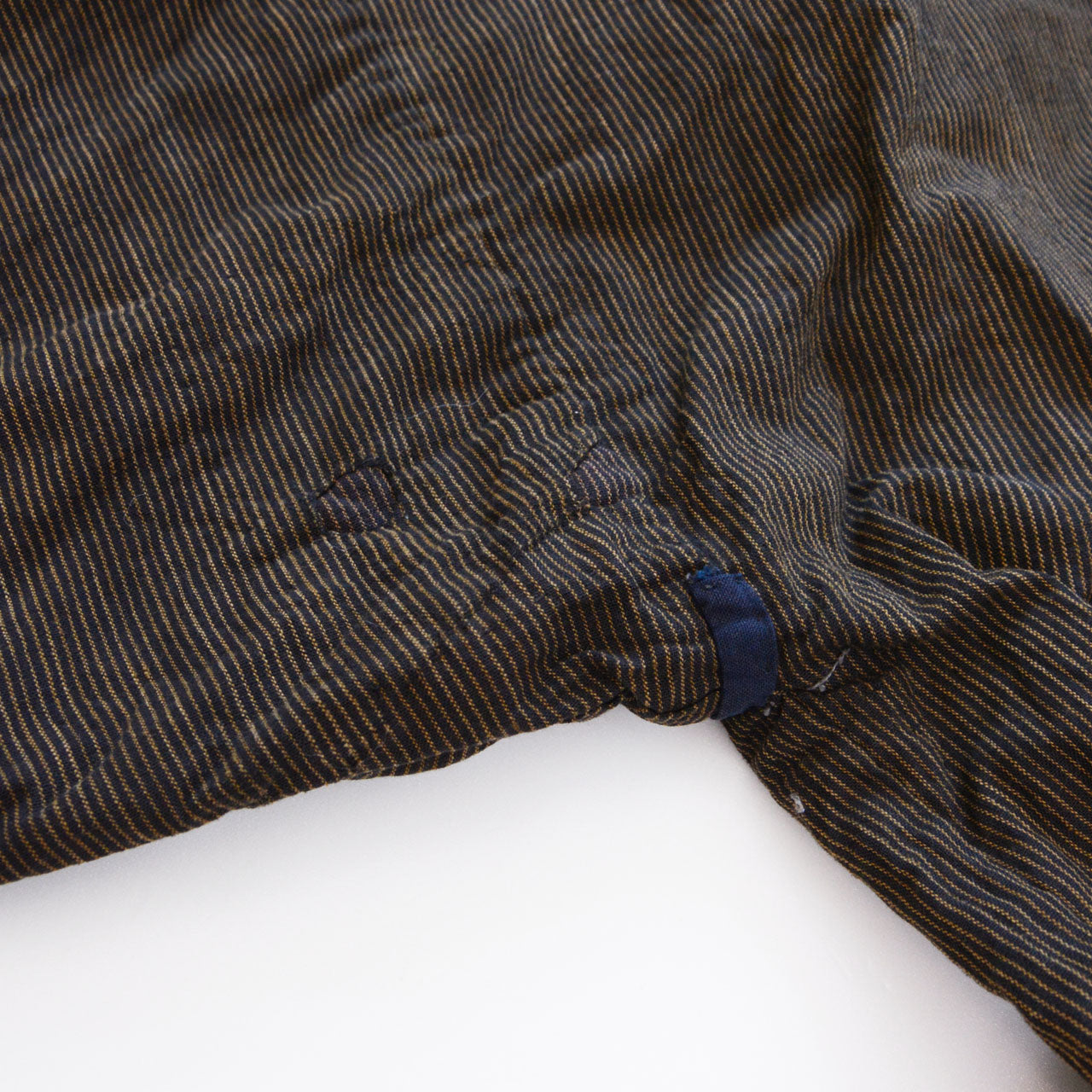 Boro noragi jacket, underarm reinforcement panel and hand-stitched repair patch, boro mending detail, pre-WWII Japan vintage, Tohoku