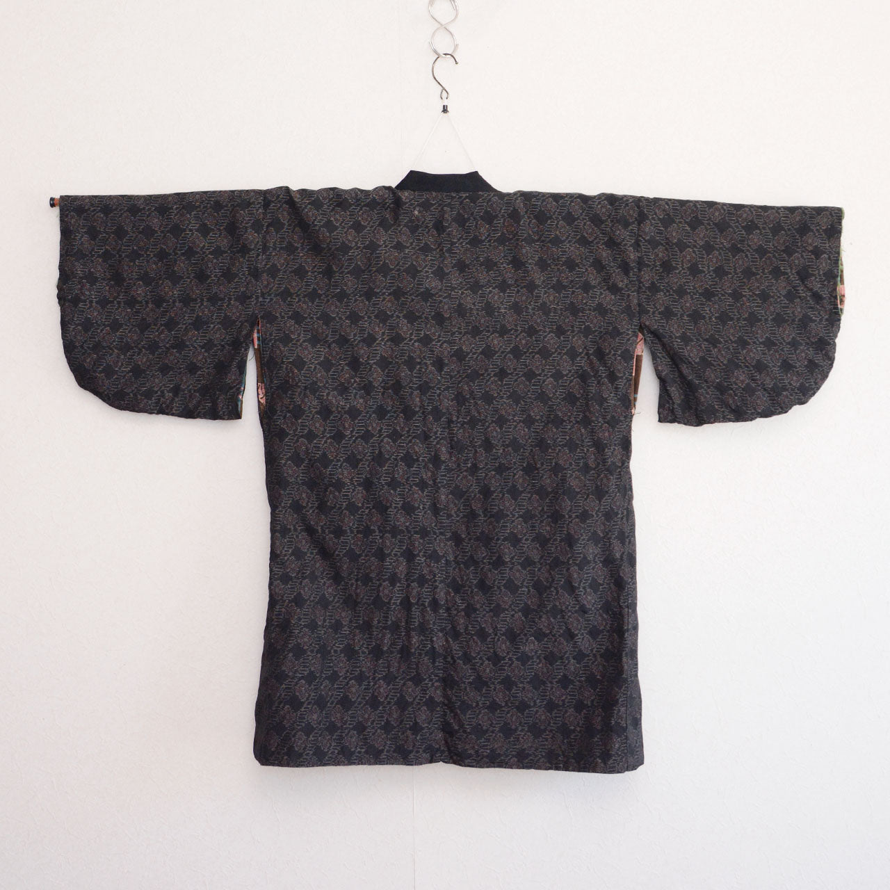 Vintage Japanese noragi jacket, outer fabric, floral mixed-weave, back view, displayed on kimono hanger, Showa era