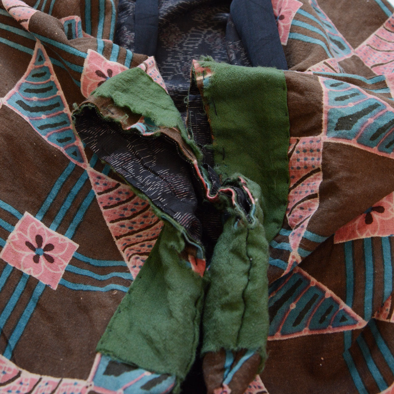 Vintage Japanese noragi jacket, reverse side, cuff area, damage and wear detail, Showa era