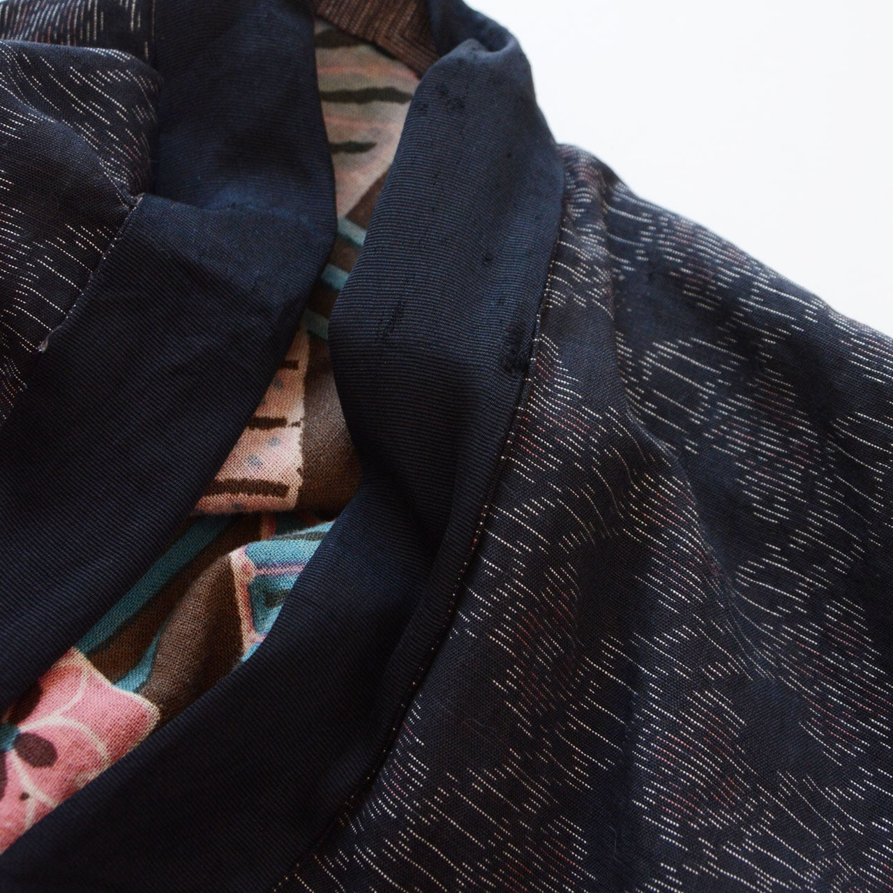 Vintage Japanese noragi jacket, collar area, damage and wear detail, Showa era