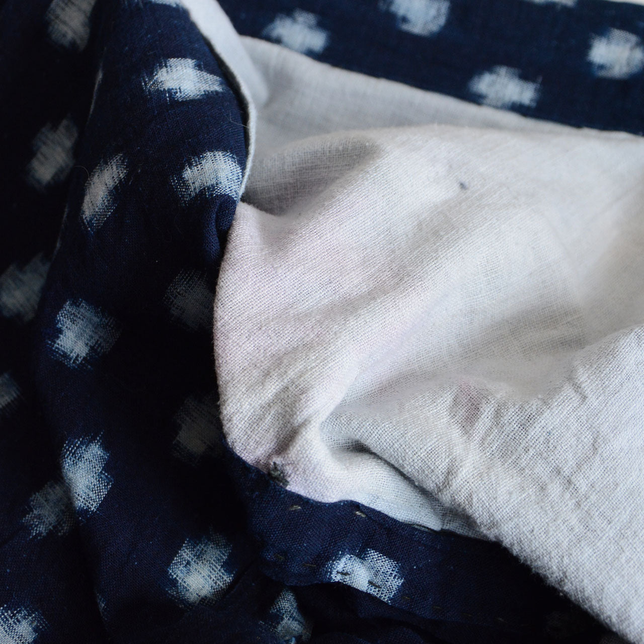 Noragi jacket made from traditional Japanese kasuri fabric.