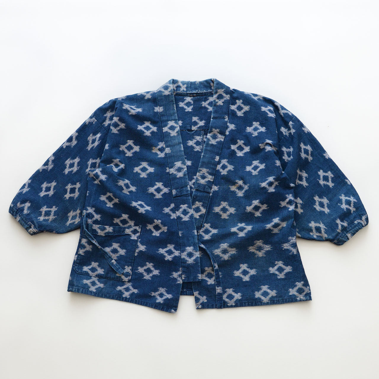 Indigo kasuri noragi jacket in diamond ikat cotton, Showa-era Japan vintage, front view
