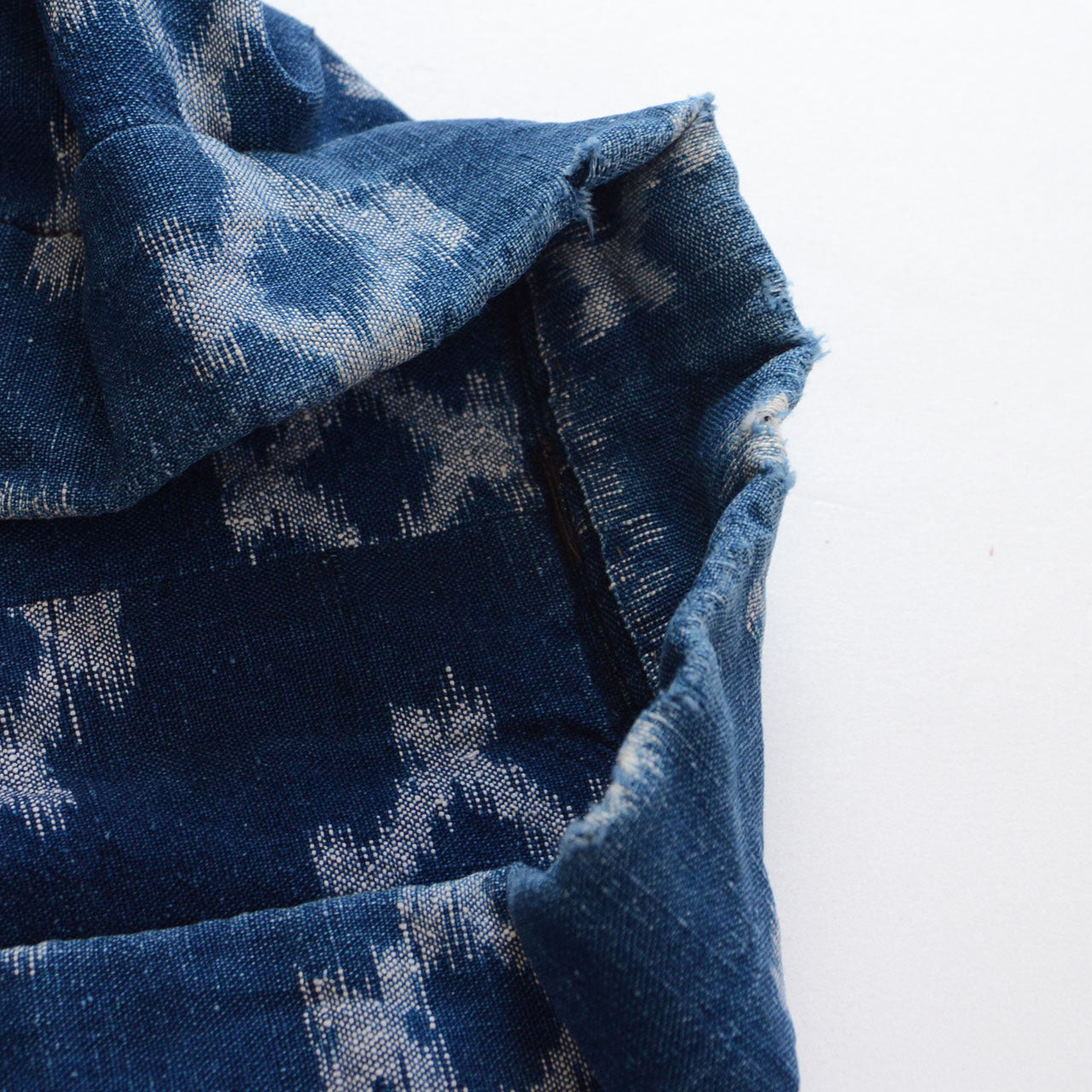 Collar damage detail of indigo kasuri noragi jacket, vintage wear, Japan antique clothing
