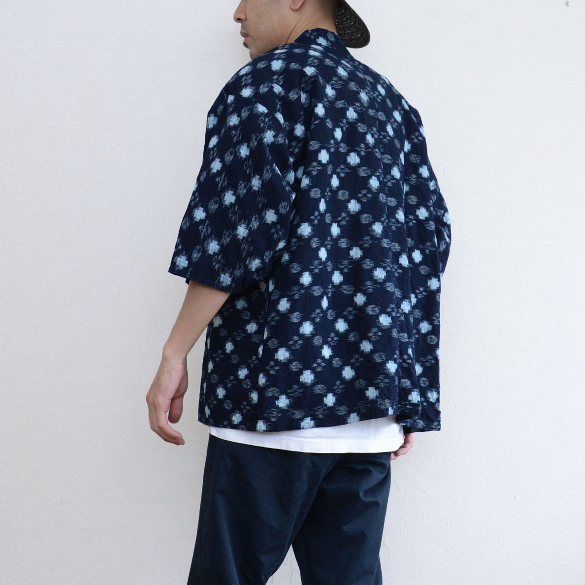 Mid-Showa indigo cotton noragi uwappari jacket with white kasuri motifs across the back body and sleeves