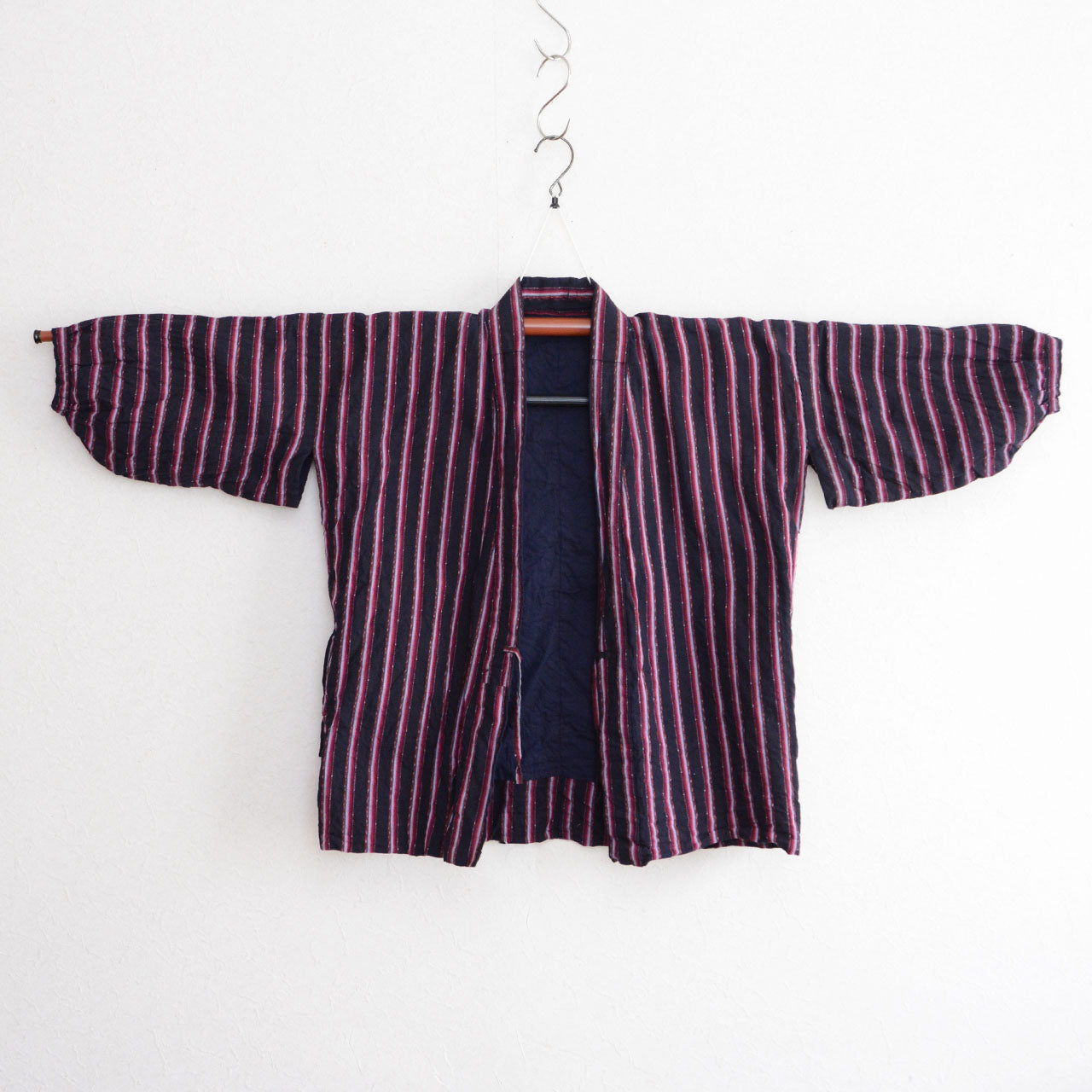 A Japanese vintage noragi garment produced in indigo cotton.