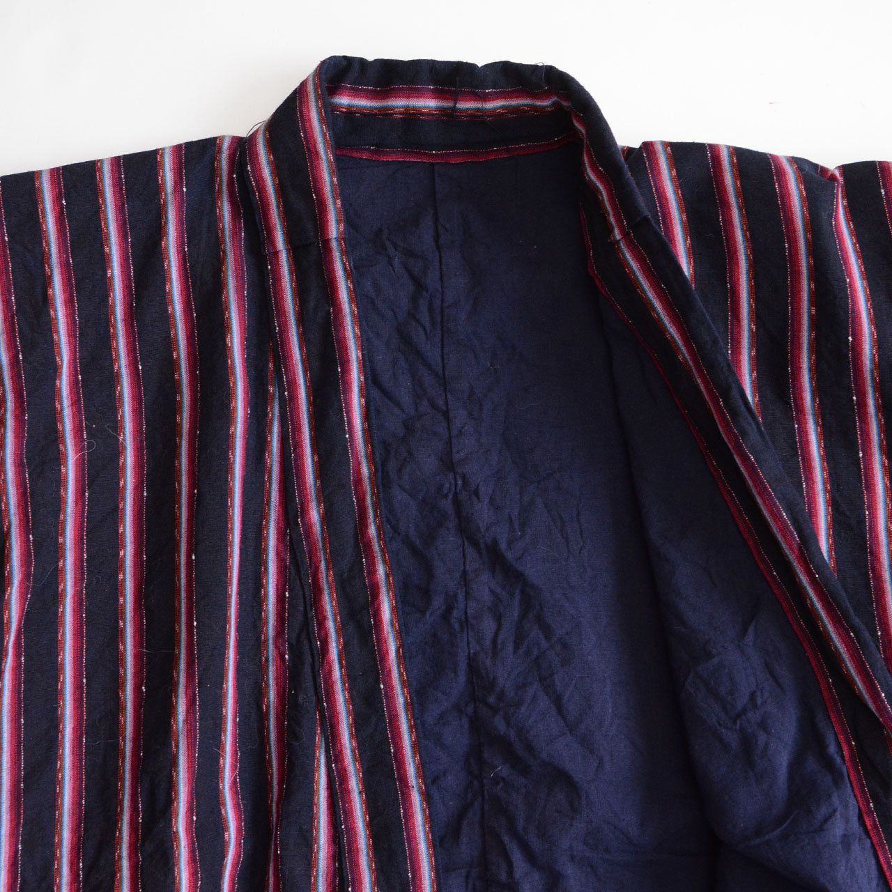 A Japanese noragi made from vintage indigo-dyed cotton.
