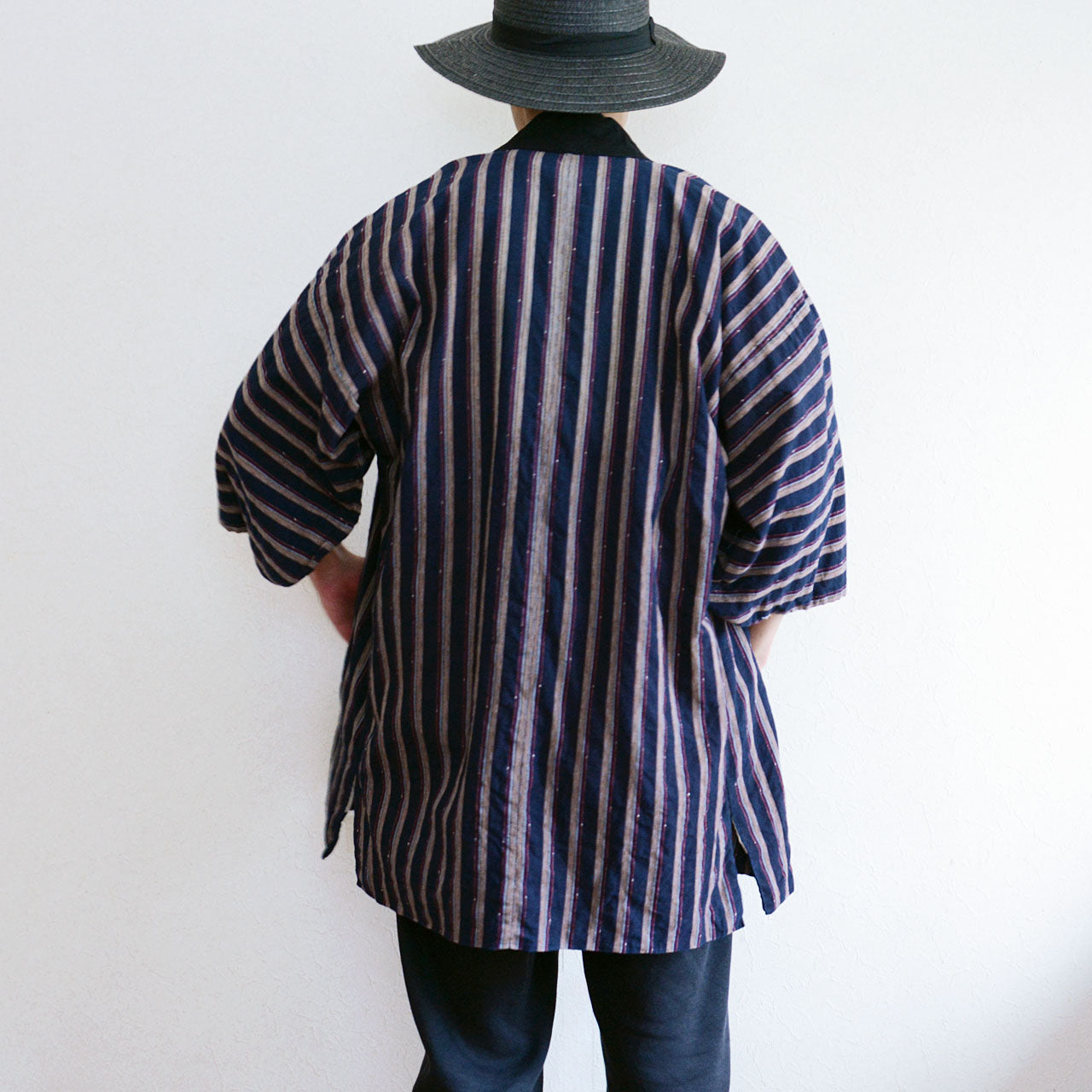 Indigo-dyed cotton Noragi capturing the essence of everyday Japanese life.