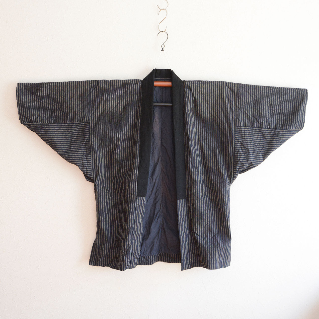 Japanese vintage noragi jacket crafted from cotton fabric, reflecting traditional rural work clothing