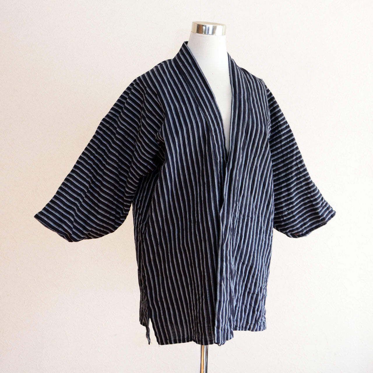 Vintage Japanese noragi jacket made from striped cotton fabric.