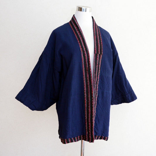 A Japanese noragi jacket with striped cotton fabric and indigo plain lining