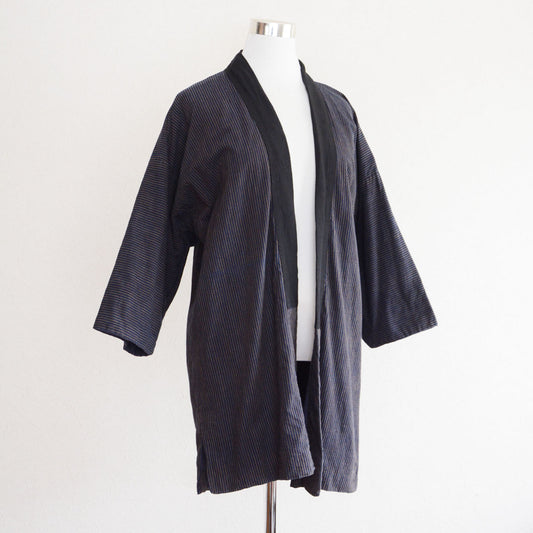 Showa mid-period Japanese noragi jacket made of indigo-dyed cotton with traditional striped pattern
