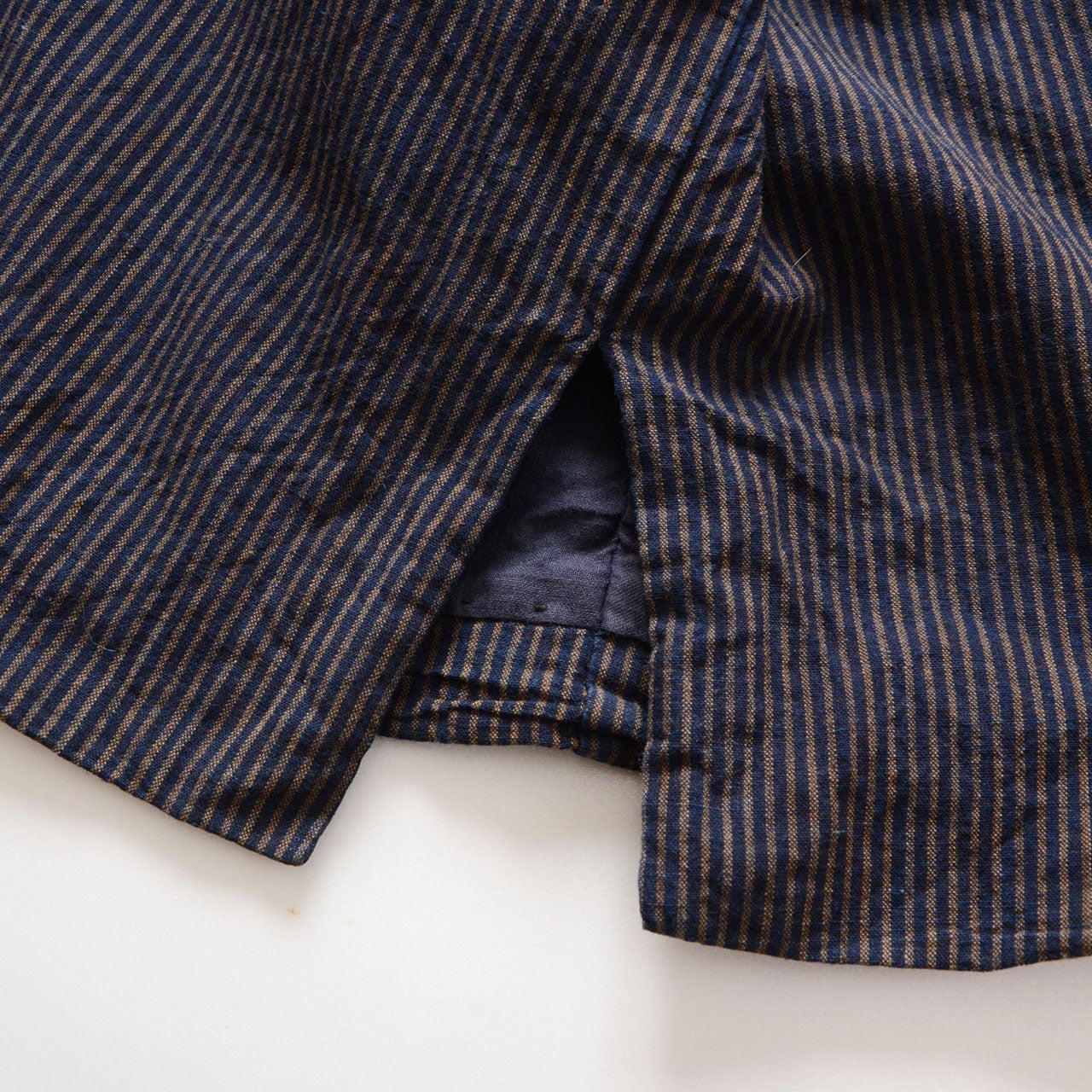 Minimalist Japanese noragi jacket showing authentic indigo-dyed striped cotton texture